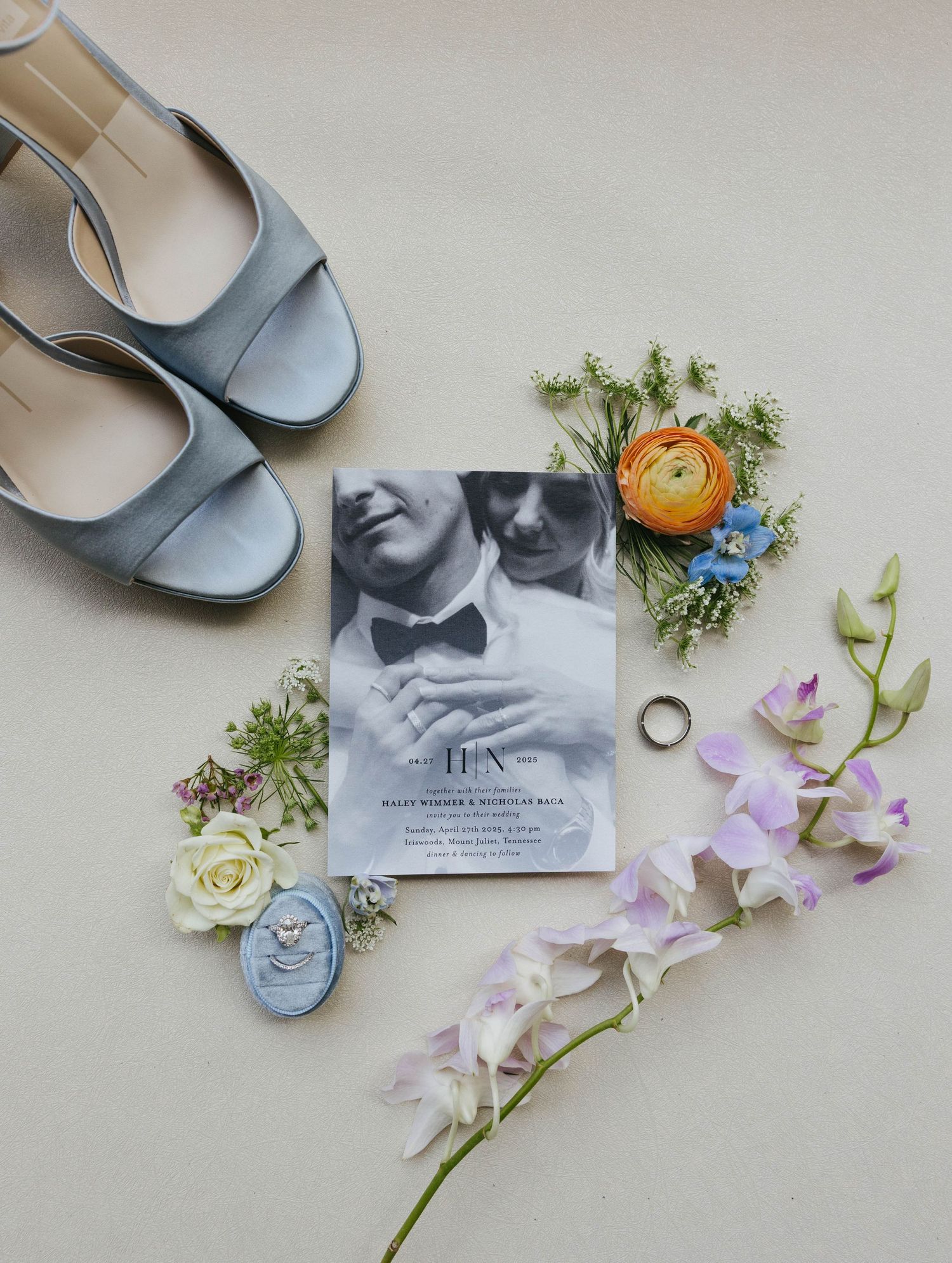 flat lay of bride and groom details