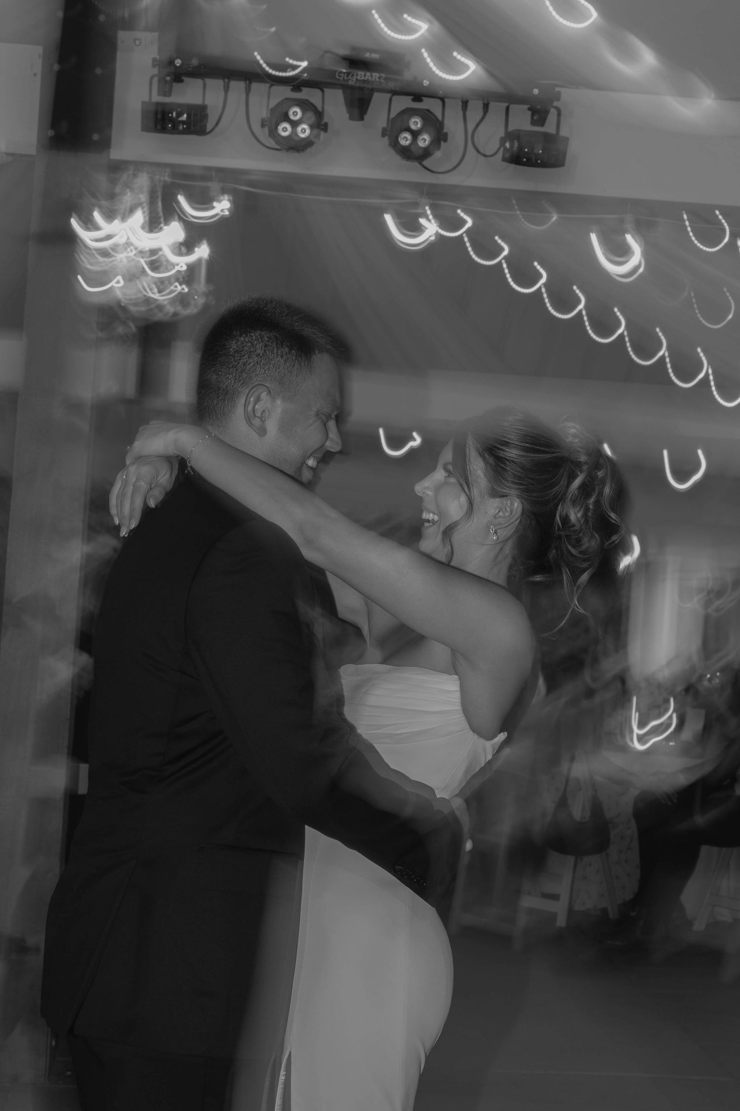 Birmingham Alabama Photographer capturing bride and groom having their first dance, at Iris Woods Venue in Nashville, Tennessee