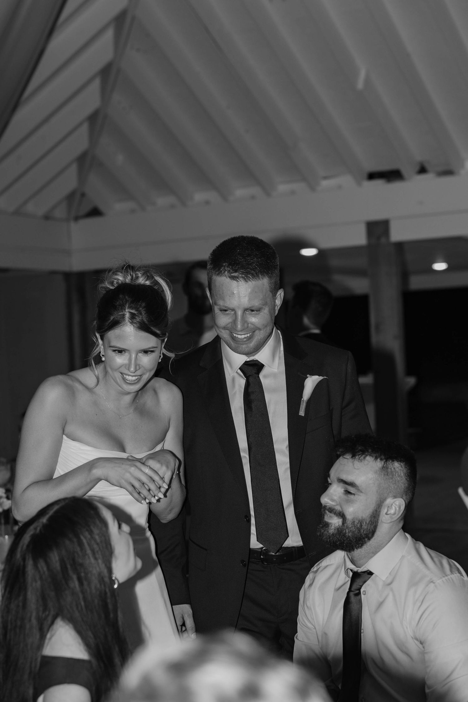 Birmingham Alabama Photographer capturing bride and groom mingling during the reception, at Iris Woods Venue in Nashville, Tennessee