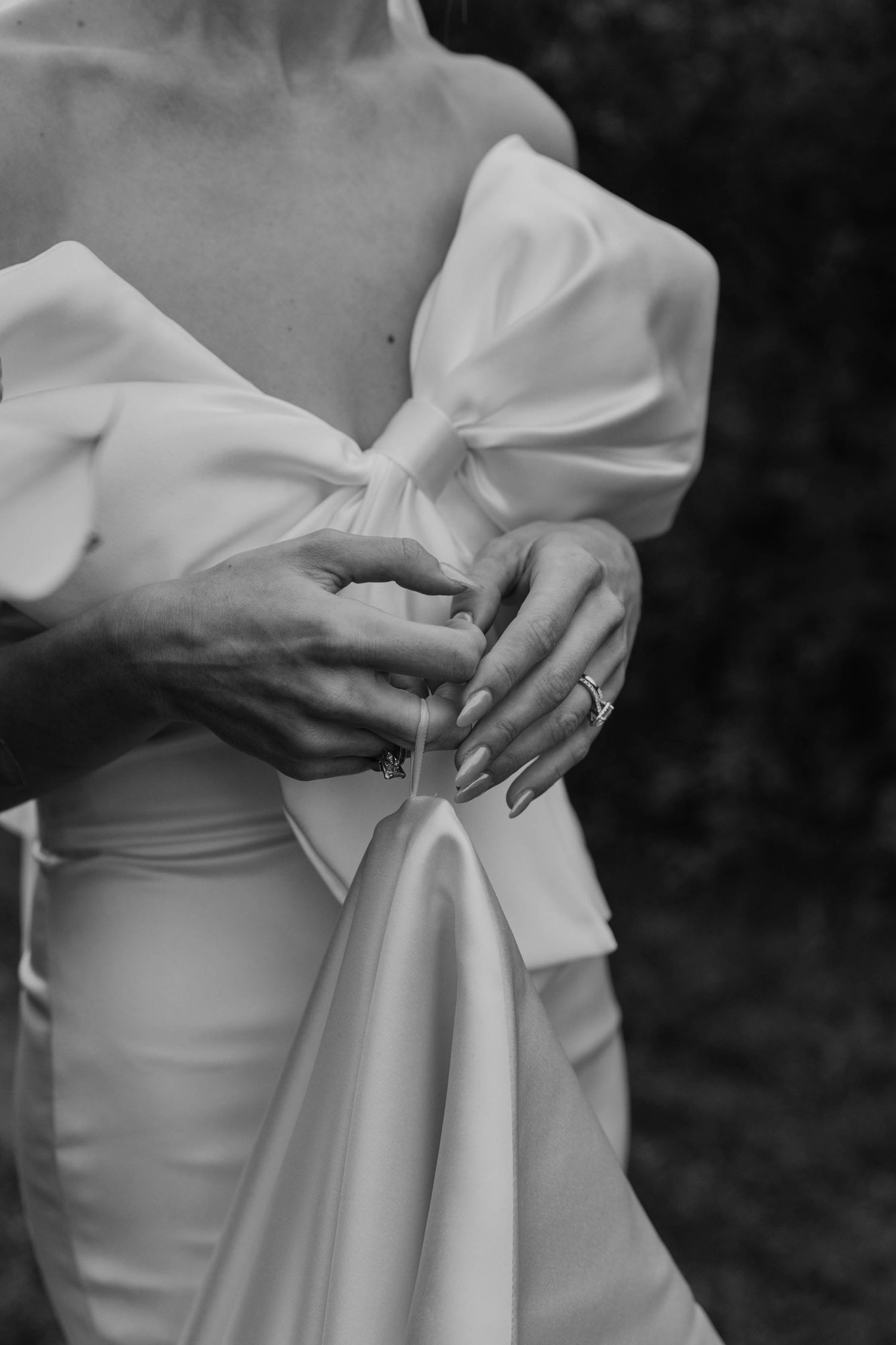 Birmingham Alabama Photographer capturing bride posing in a field, at Iris Woods Venue in Nashville, Tennessee