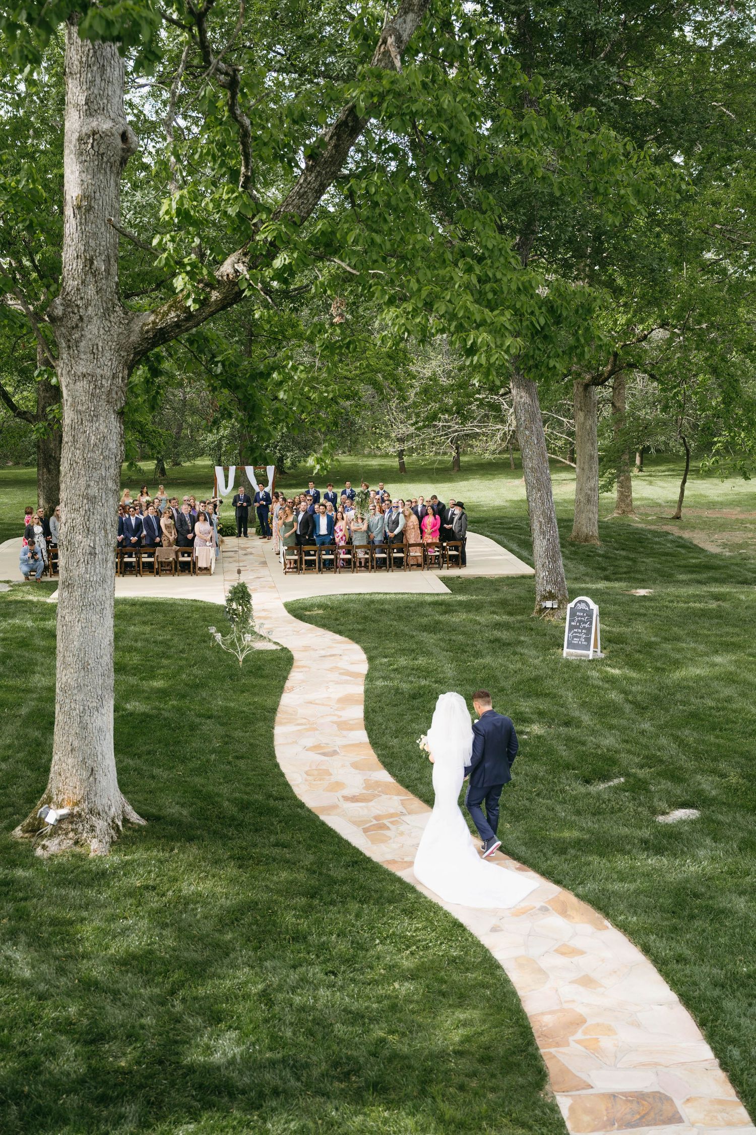bride being walked down the isle