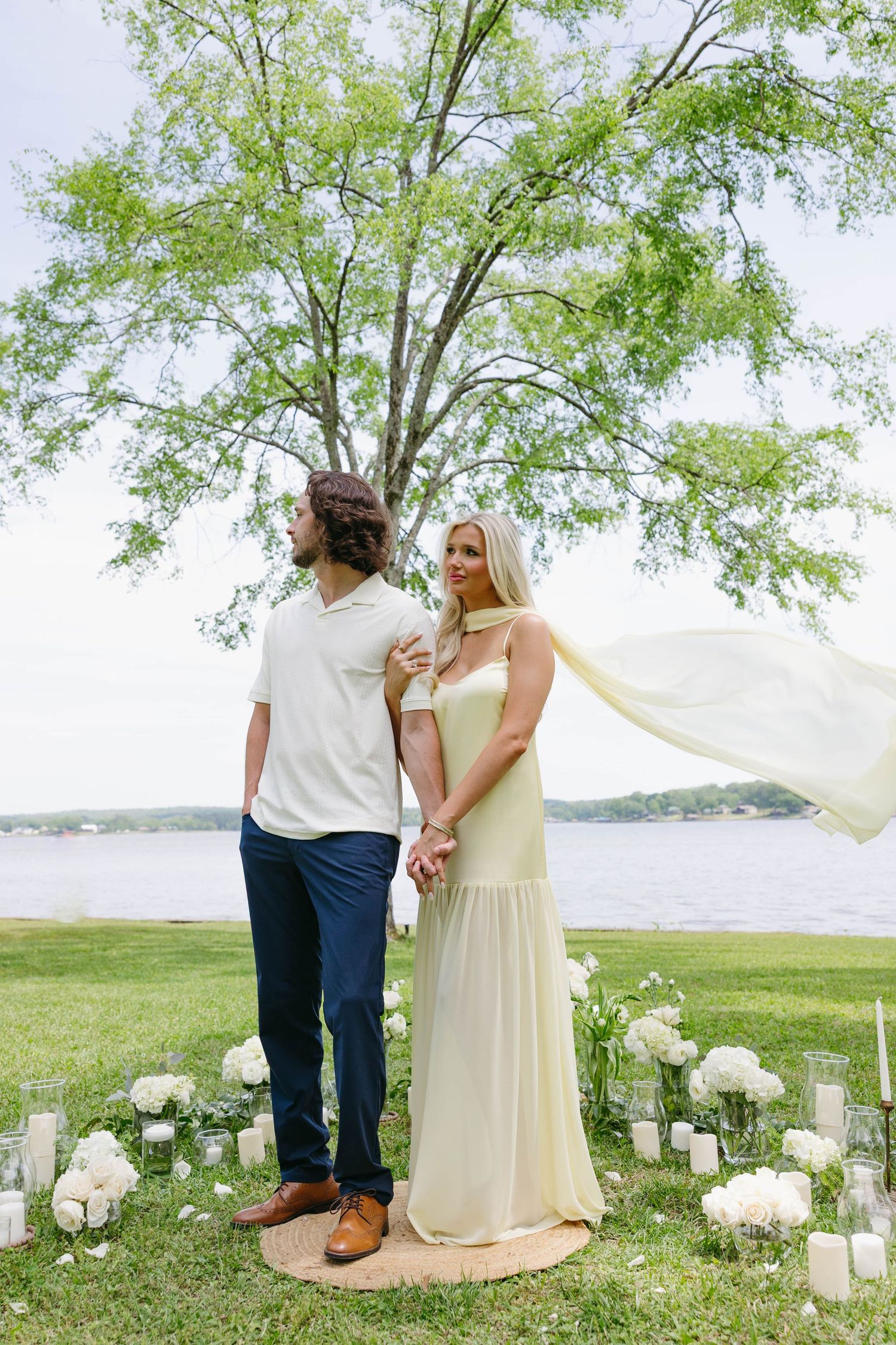 couple photos after their proposal with fiancé wearing a yellow dress from showmeyourmumu