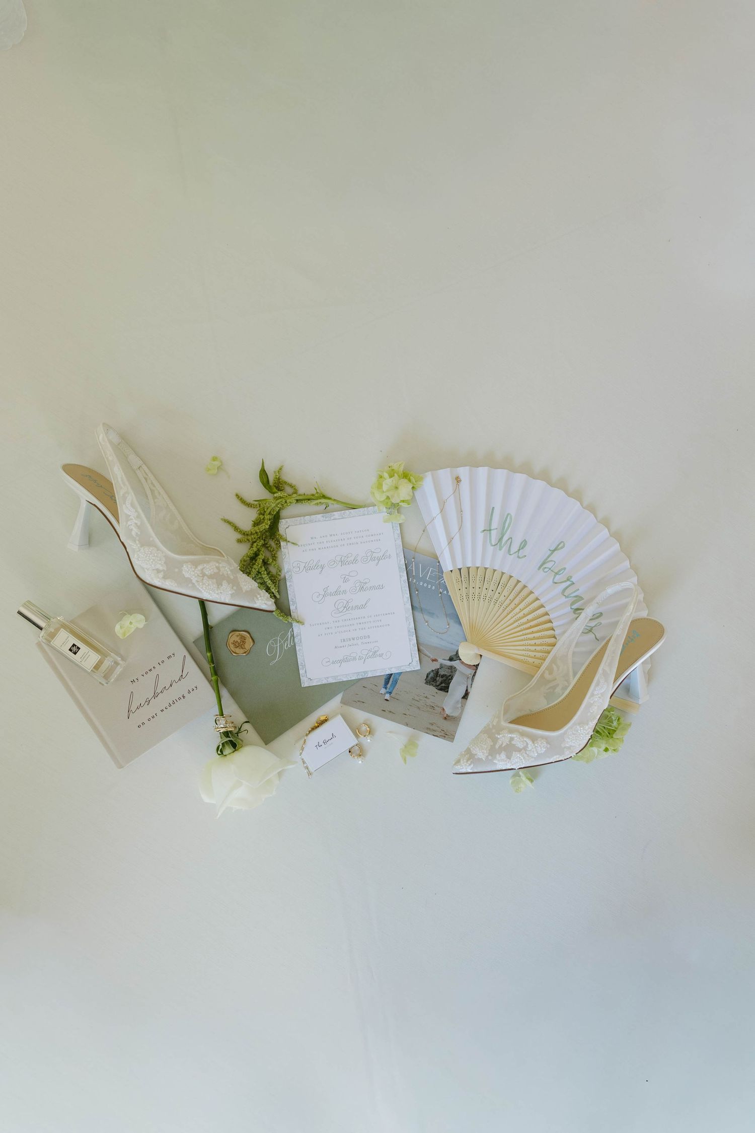Birmingham Alabama Photographer capturing bride's wedding details and invitations at Iris Woods Venue in Nashville, Tennessee