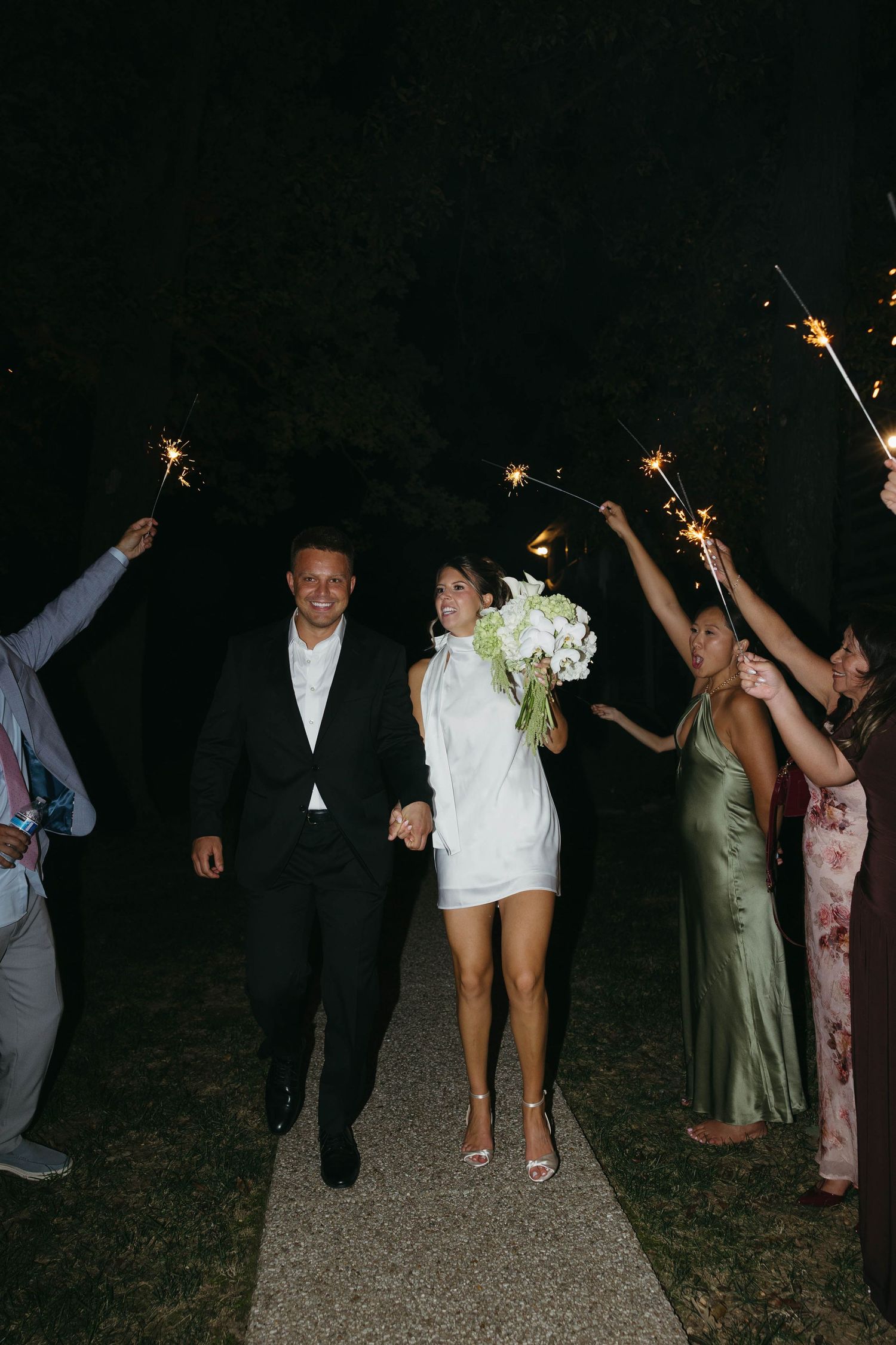 Birmingham Alabama Photographer capturing a couple during their send off, at Iris Woods Venue in Nashville, Tennessee