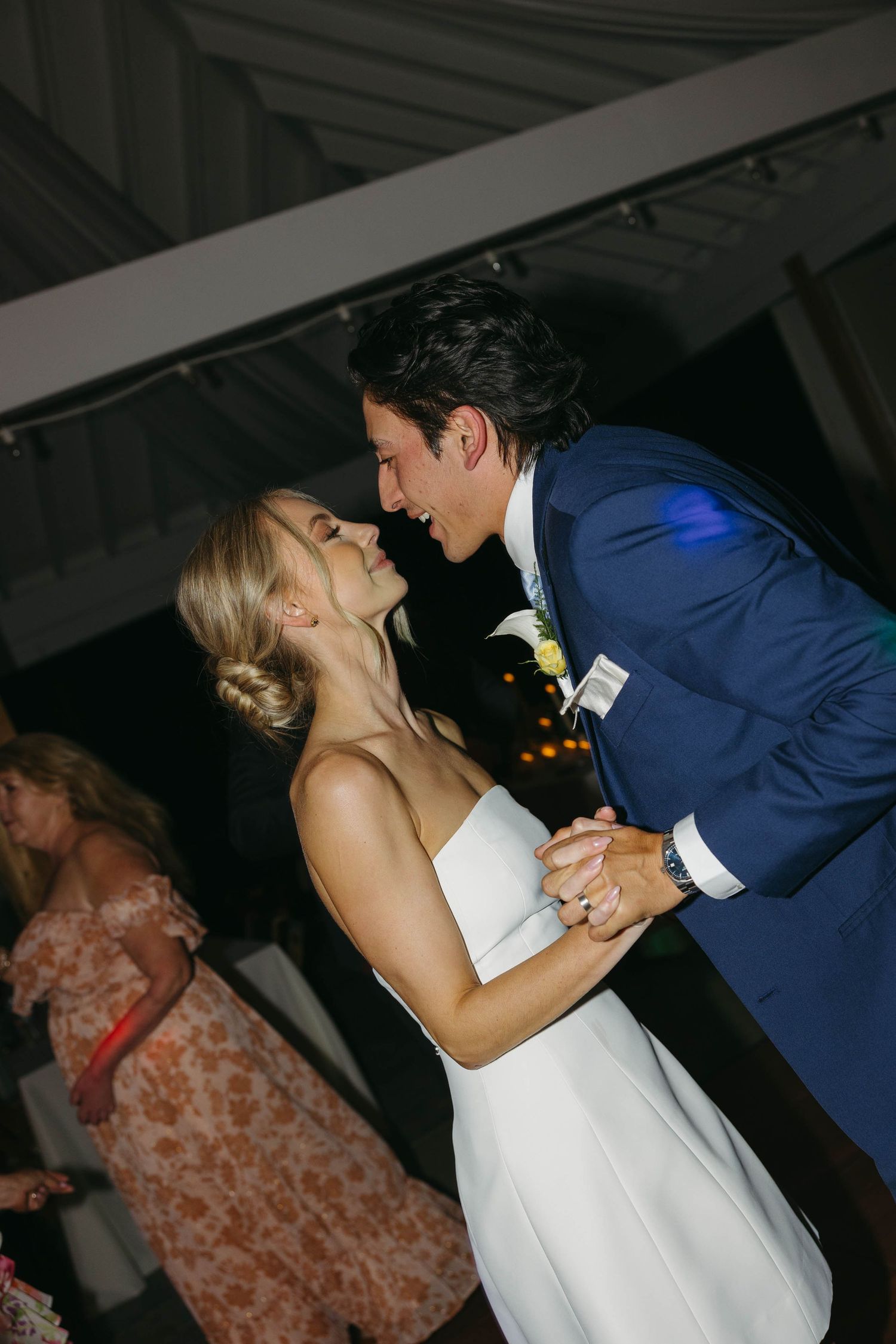 Birmingham Alabama Photographer capturing Bride and groom dancing and smiling, at iris woods wedding venue in Nashville Tennessee
