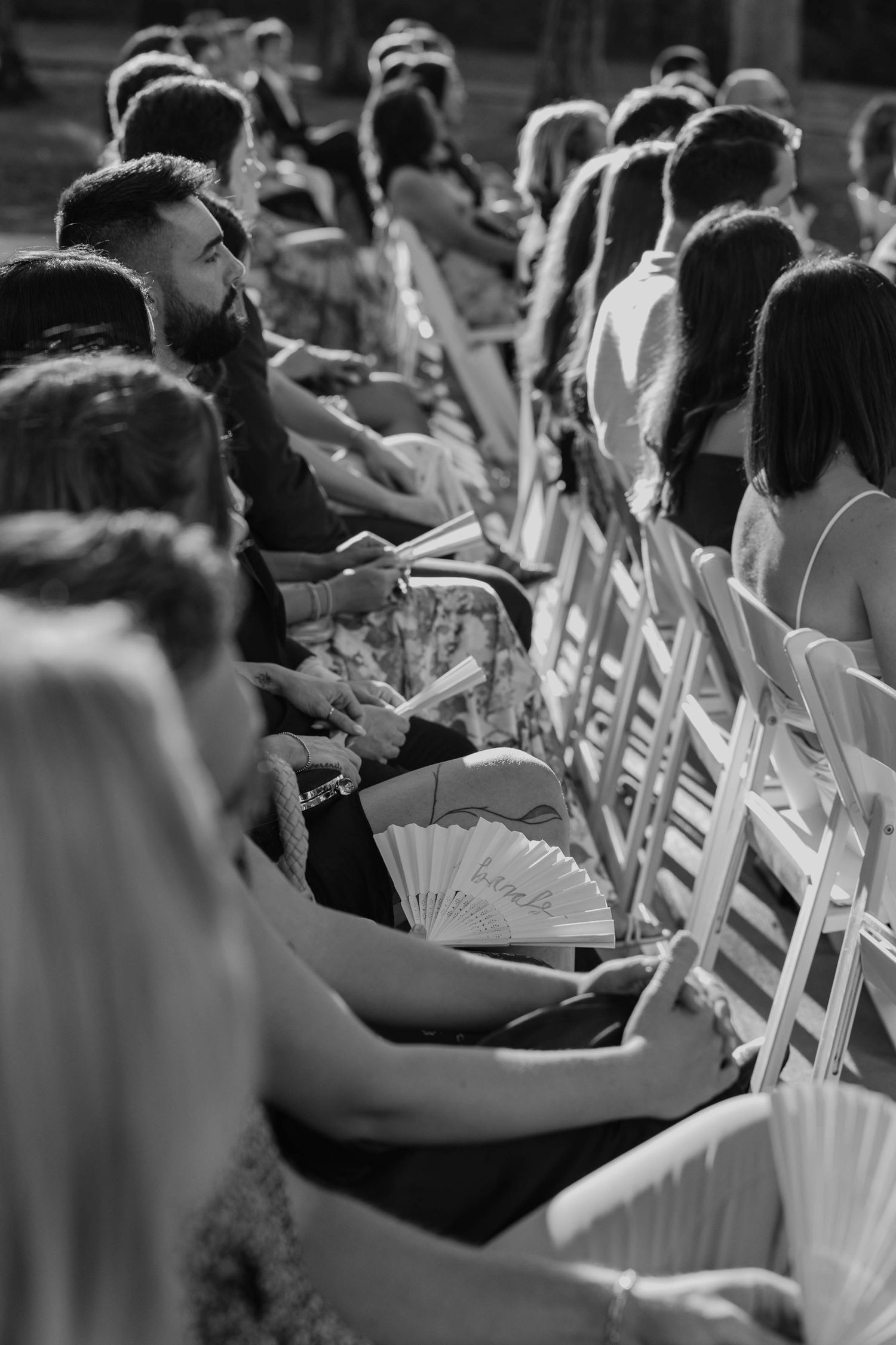 Birmingham Alabama Photographer capturing guests during the wedding at the ceremony space, at Iris Woods Venue in Nashville, Tennessee