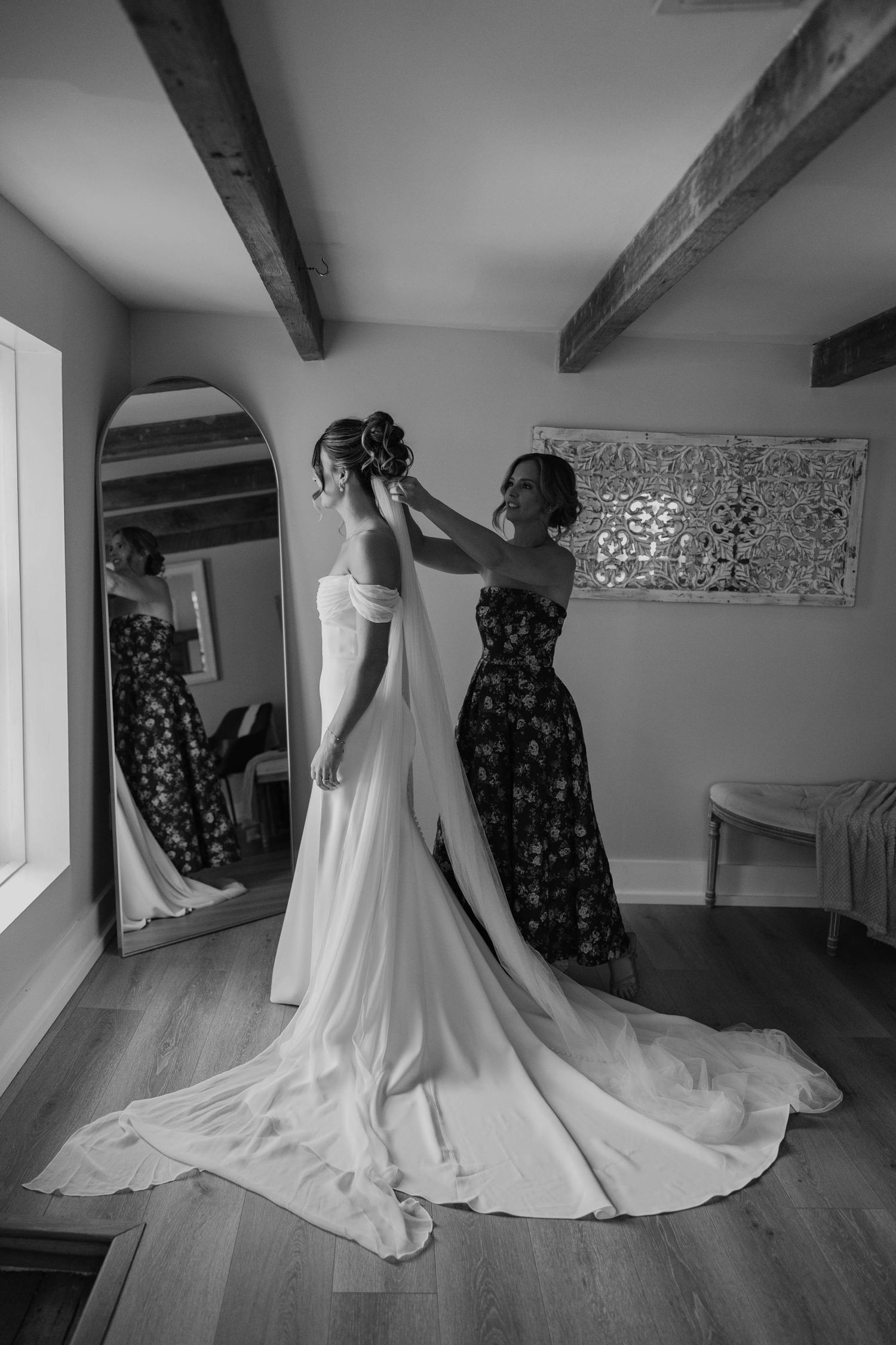 Birmingham Alabama Photographer capturing mother of bride putting on the bride's veil, at Iris Woods Venue in Nashville, Tennessee