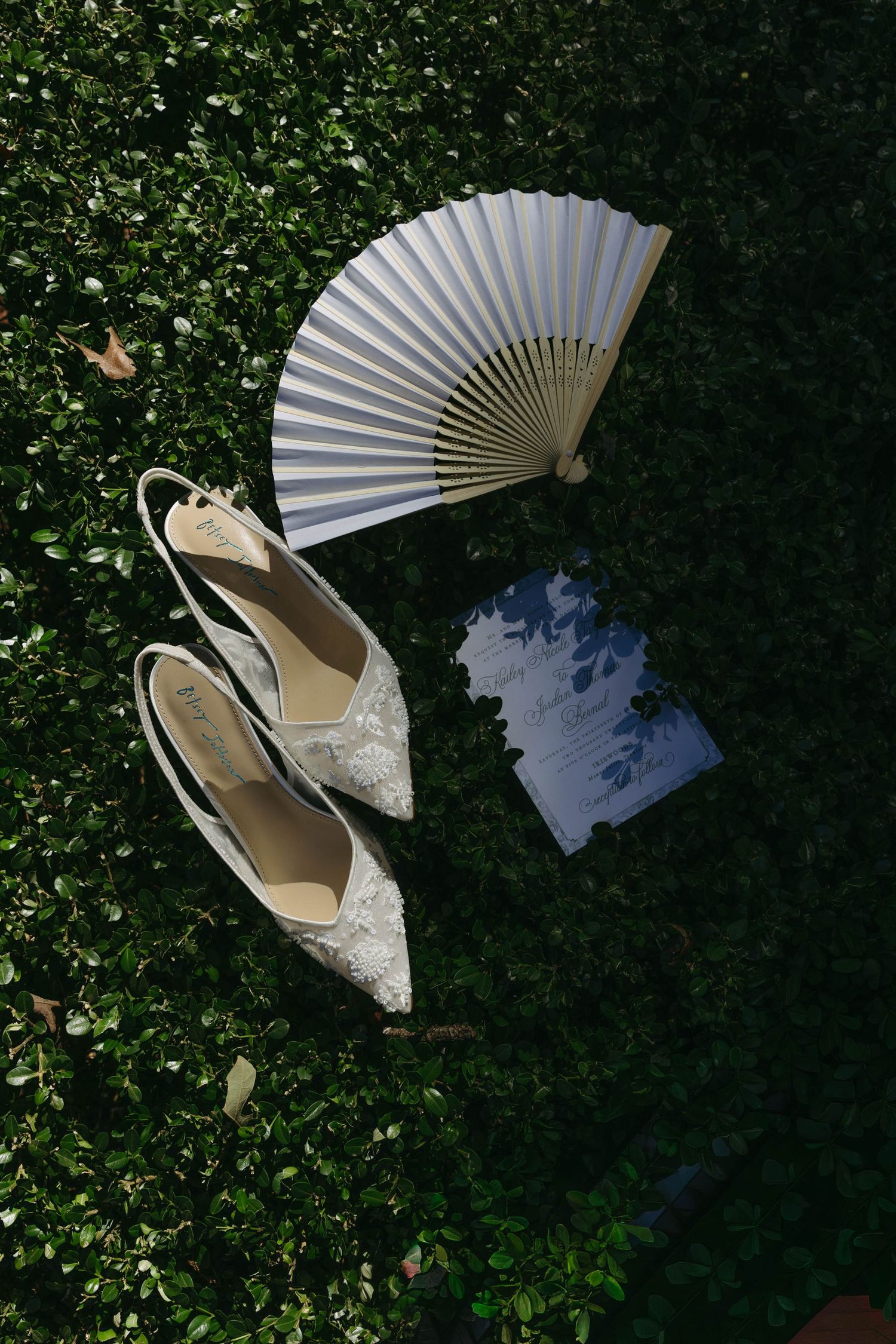 Birmingham Alabama Photographer capturing bride's wedding details and invitations at Iris Woods Venue in Nashville, Tennessee