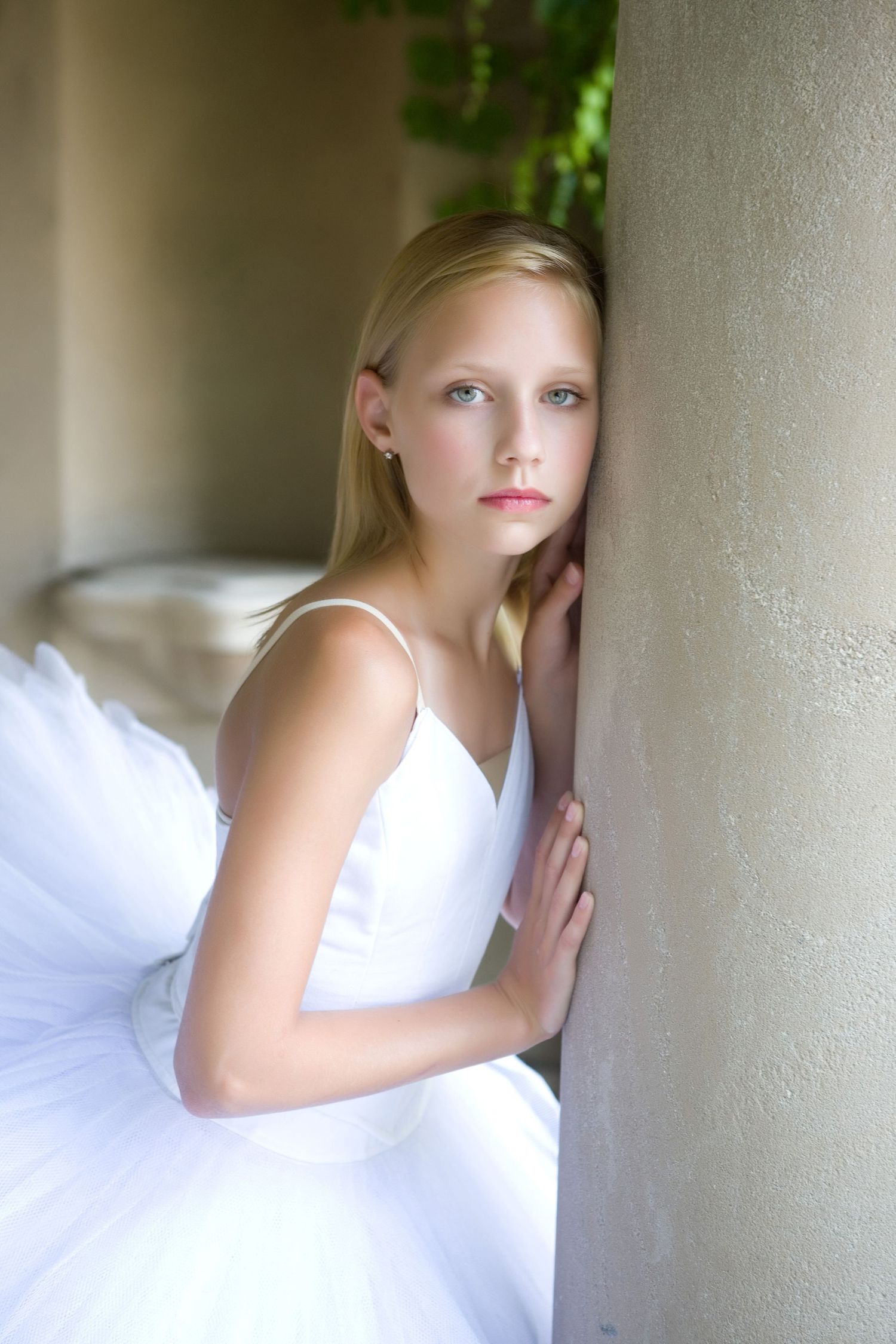 Fine art children's milestone session in Rochester, MI by Jocelyn M. Photography—young blonde ballerina in white tutu. (