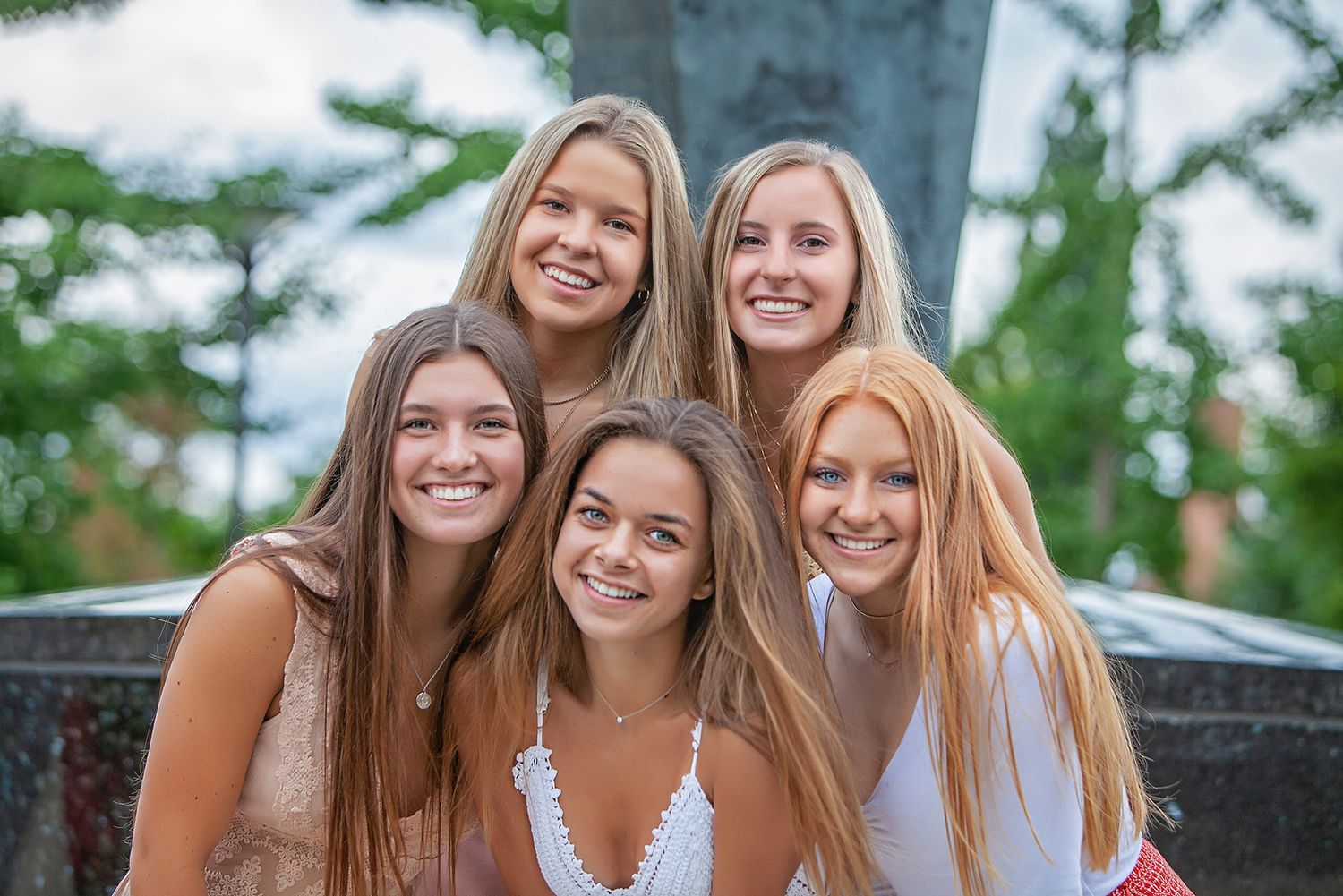 16-year-old milestone portrait session in Rochester, MI by Jocelyn M. Photography—five teen girls posing together.