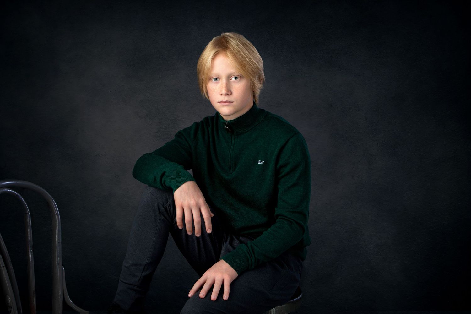 Milestone 12 year portrait session in Rochester, MI by Jocelyn M. Photography—blonde teenage boy in green turtleneck.