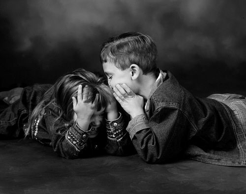 Children's milestone hero portrait in Rochester, MI by Jocelyn M. Photography—black and white sibling secret photo.