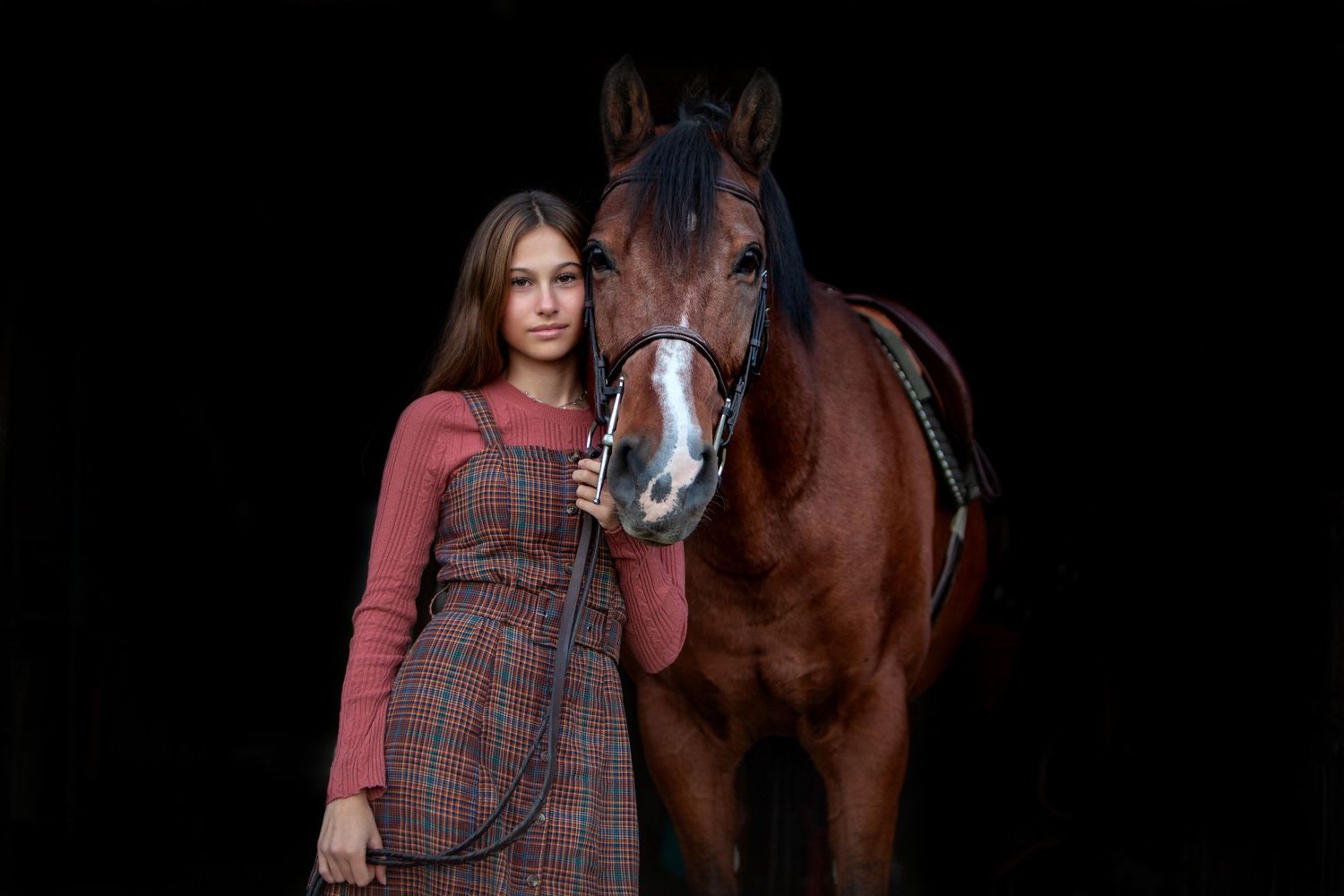Fine art child portrait with horse in Rochester, MI by Jocelyn M. Photography—12-year-old girl with a bay horse.