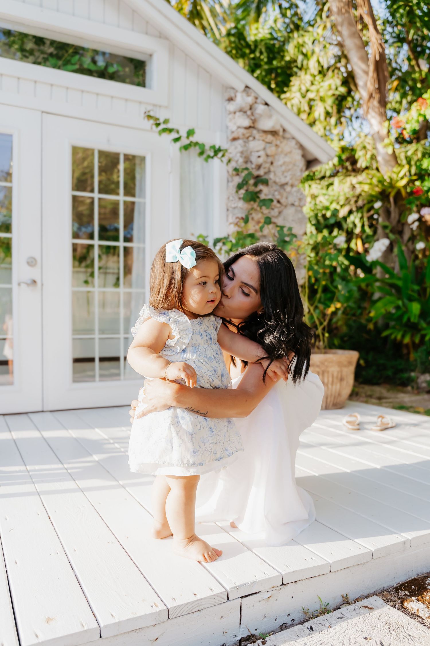 Outdoor photo session of mother and daughter at sunset