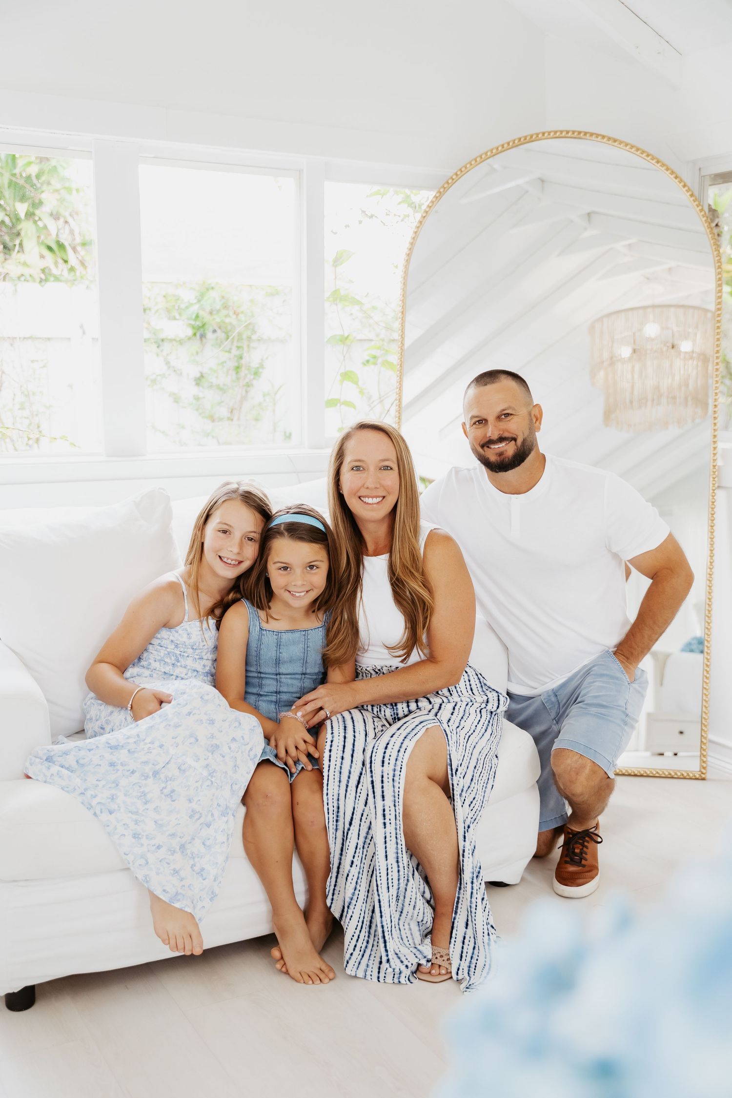 Editorial-style portrait of a family in neutral tones at Redland cottage in Miami, FL