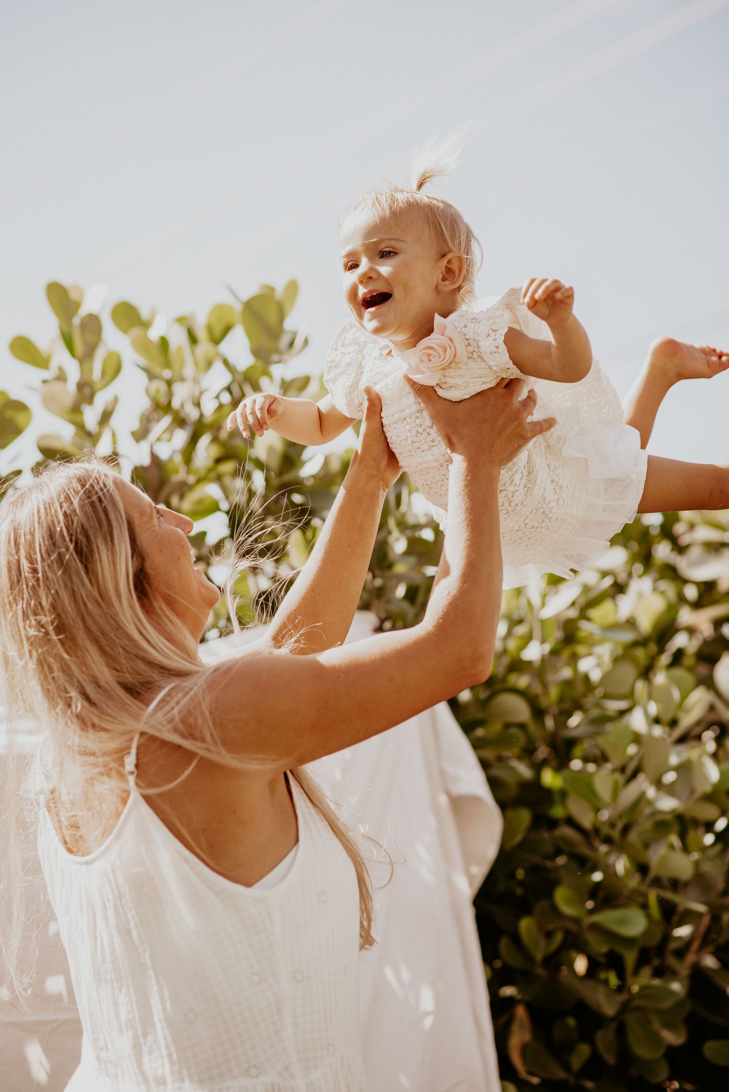 Mom and daughter sharing a quiet moment during documentary-style session in the Florida Keys