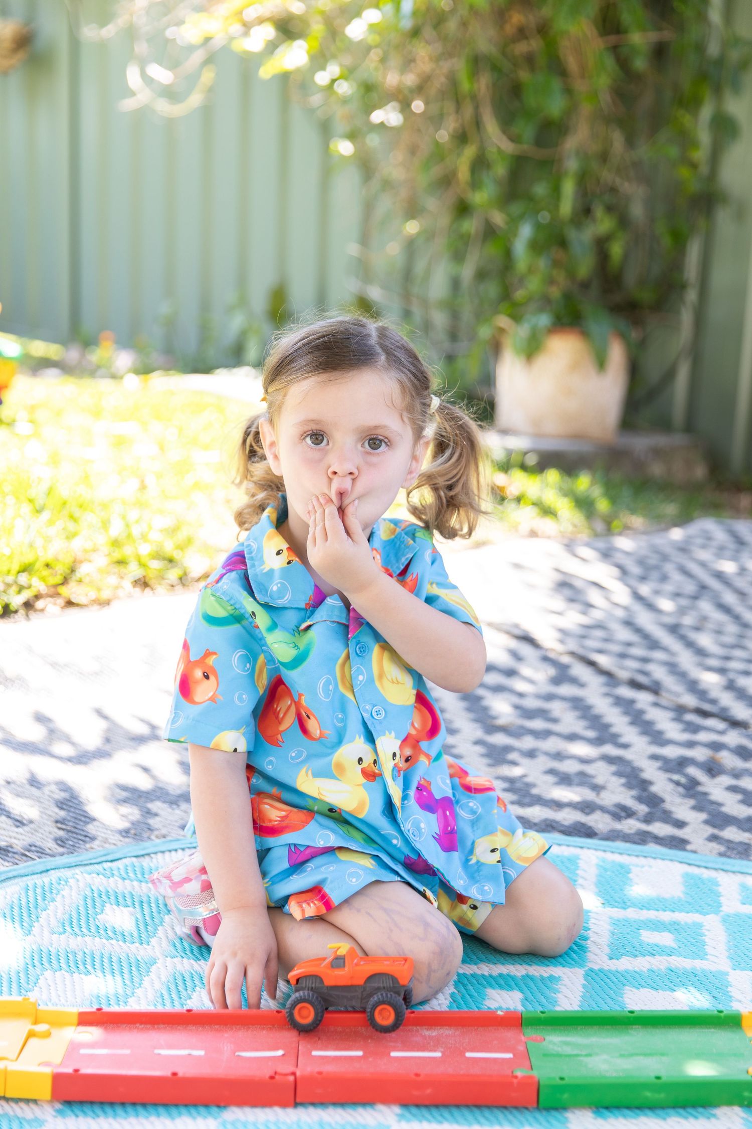 Candid preschool moment with children playing outdoors on the Coffs Coast