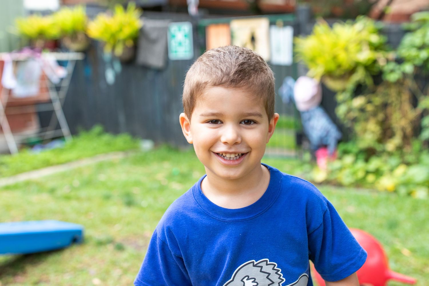 Candid preschool moment with children playing outdoors on the Coffs Coast
