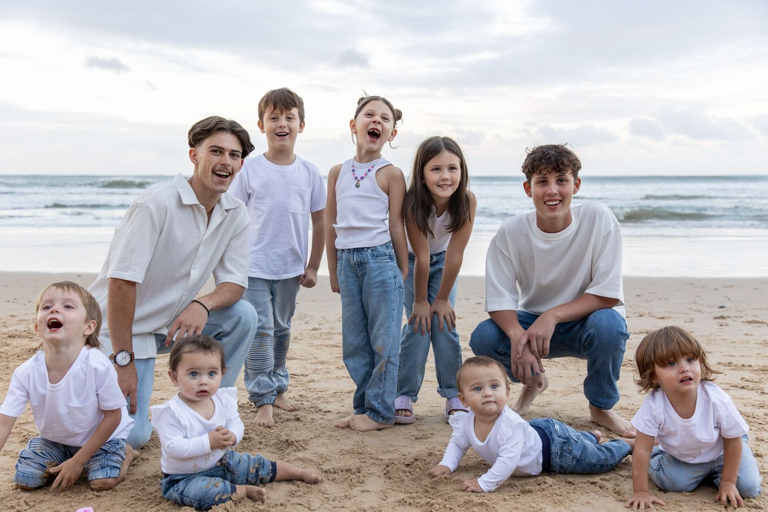 Candid family portrait at the beach – Coffs Coast photographer