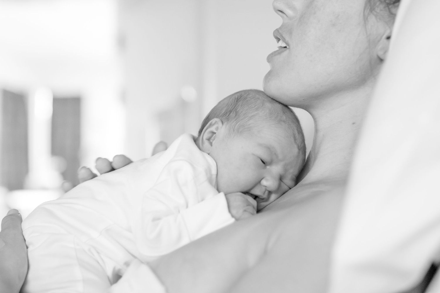 Emotional first family moments captured in a Fresh 48 session.