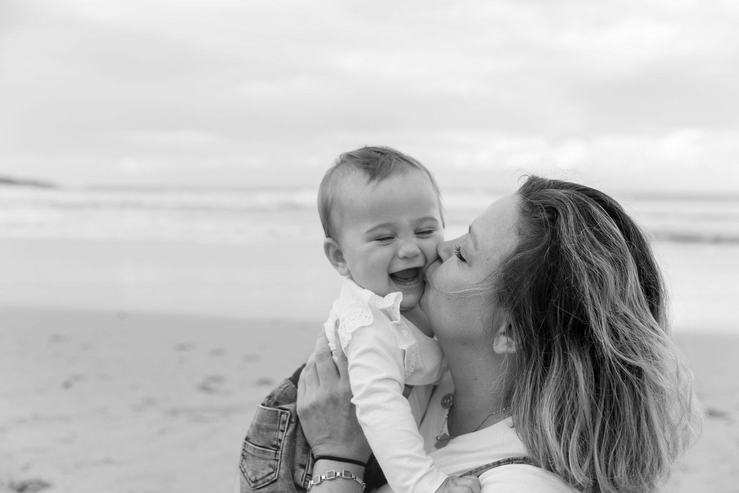 Candid family portrait at the beach – Coffs Coast photographer