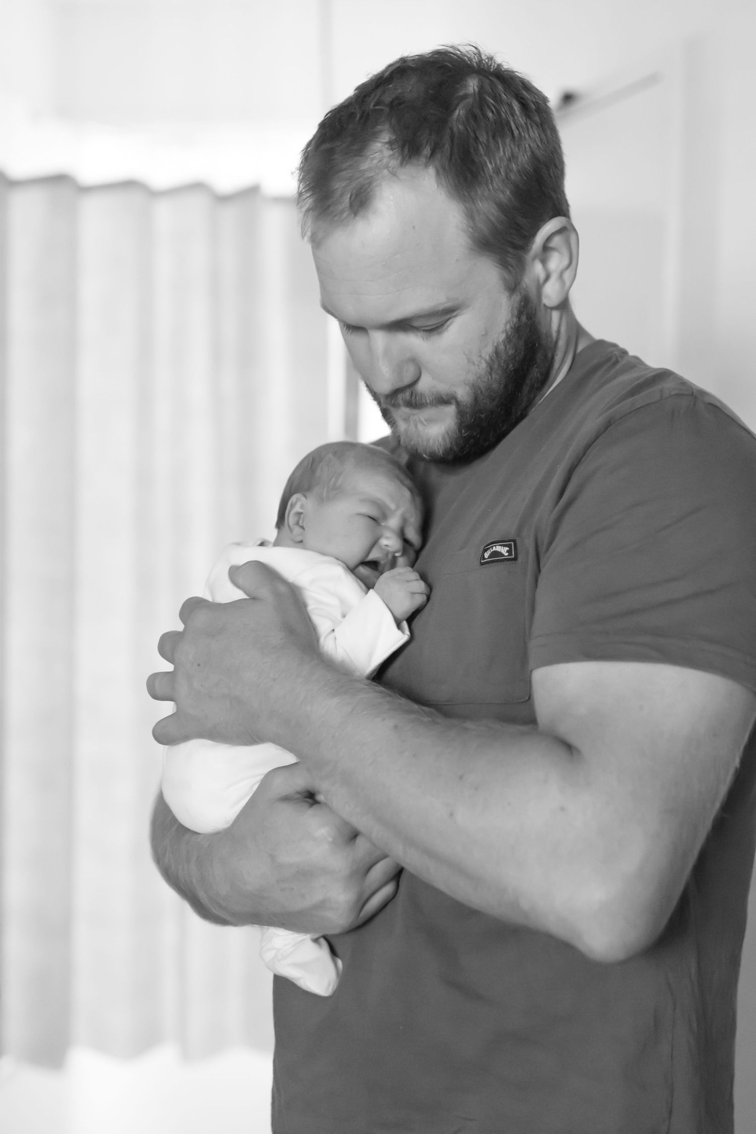 Emotional first family moments captured in a Fresh 48 session.