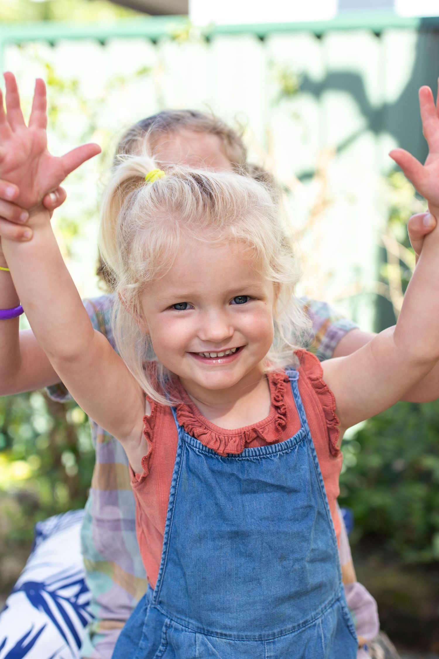 Candid preschool moment with children playing outdoors on the Coffs Coast
