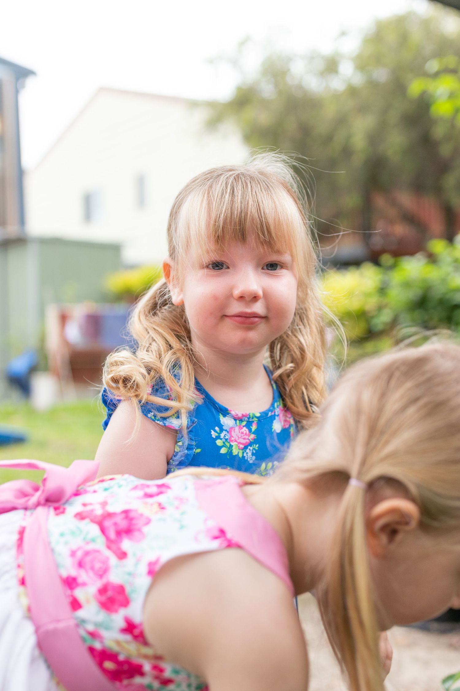 Candid preschool moment with children playing outdoors on the Coffs Coast