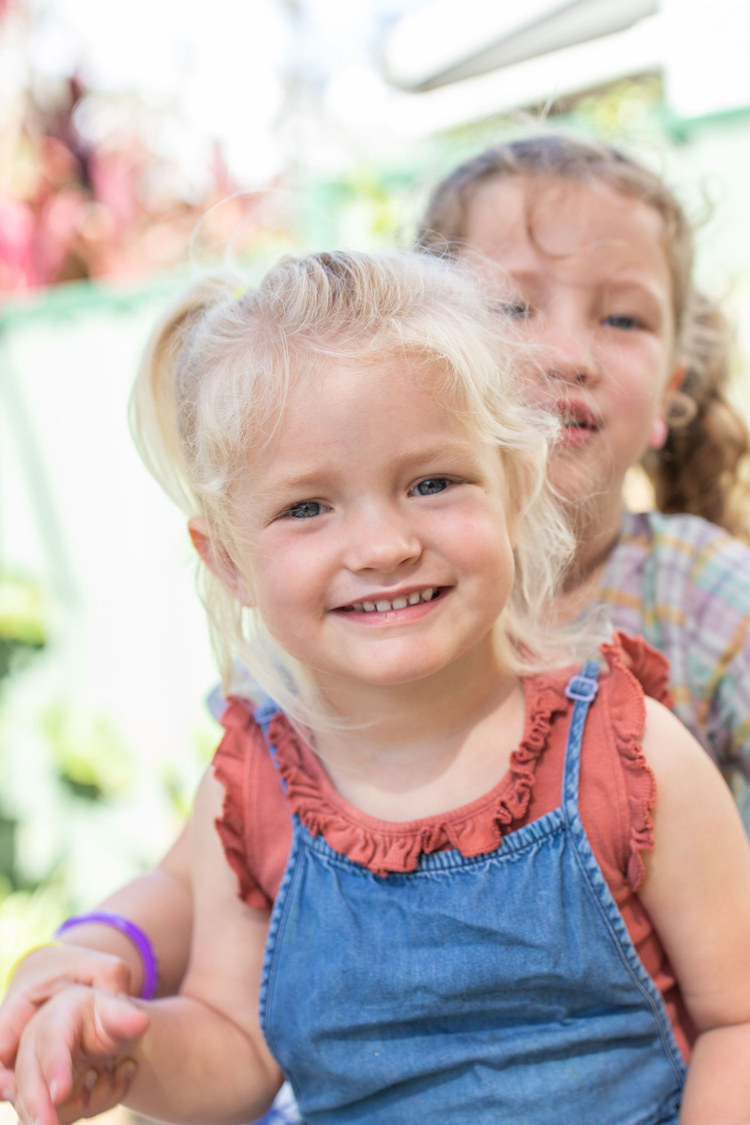 Candid preschool moment with children playing outdoors on the Coffs Coast