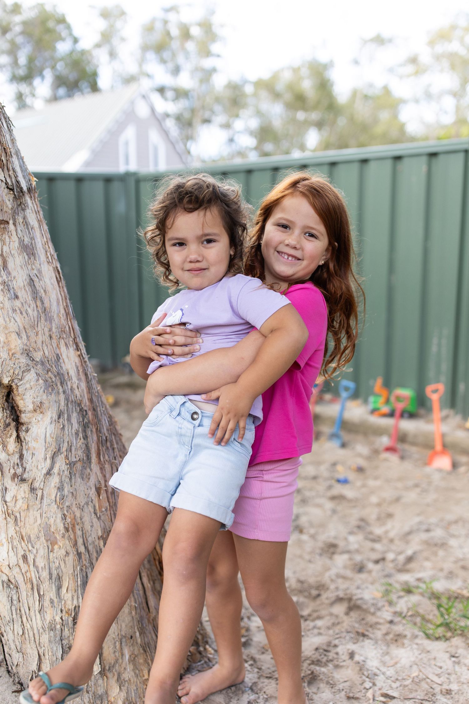 Candid preschool moment with children playing outdoors on the Coffs Coast