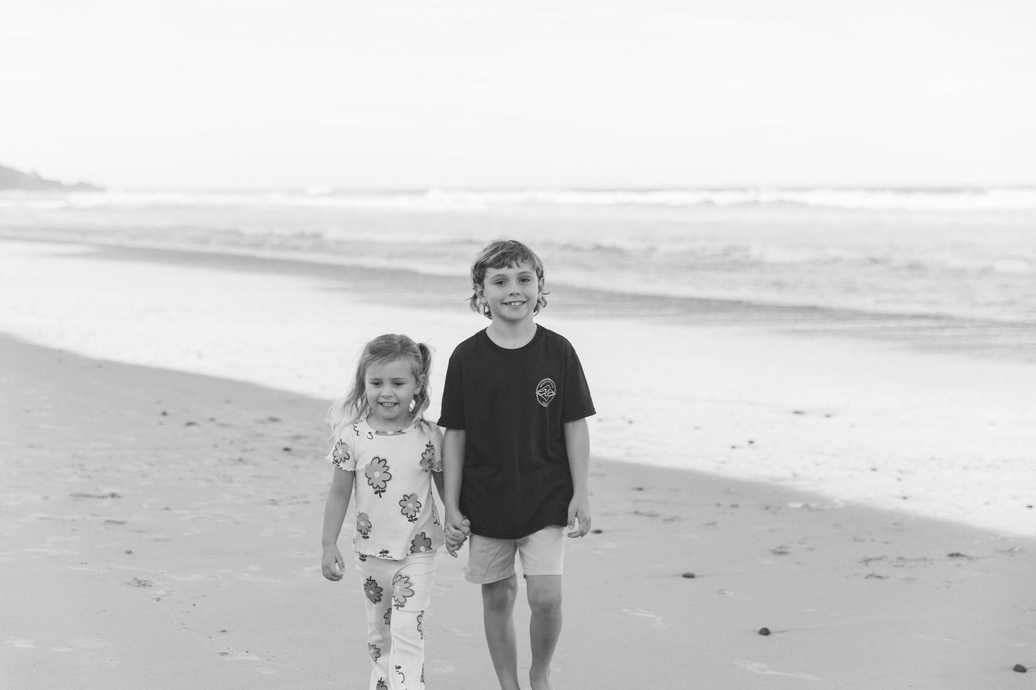 Candid family portrait at the beach – Coffs Coast photographer