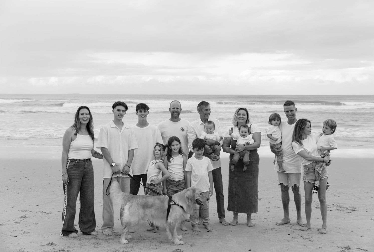 Candid family portrait at the beach – Coffs Coast photographer