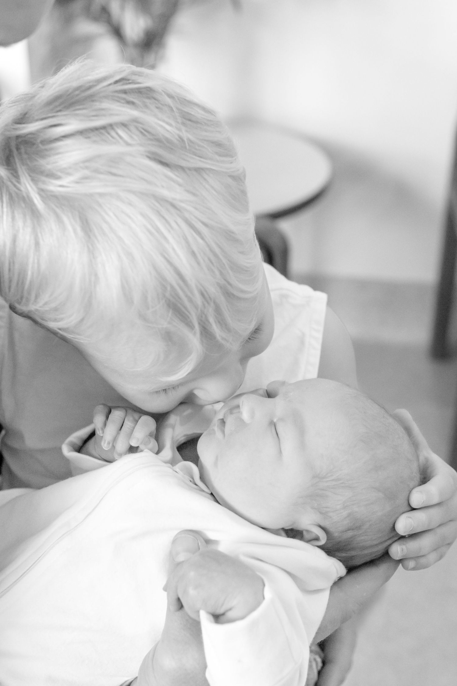 Emotional first family moments captured in a Fresh 48 session.