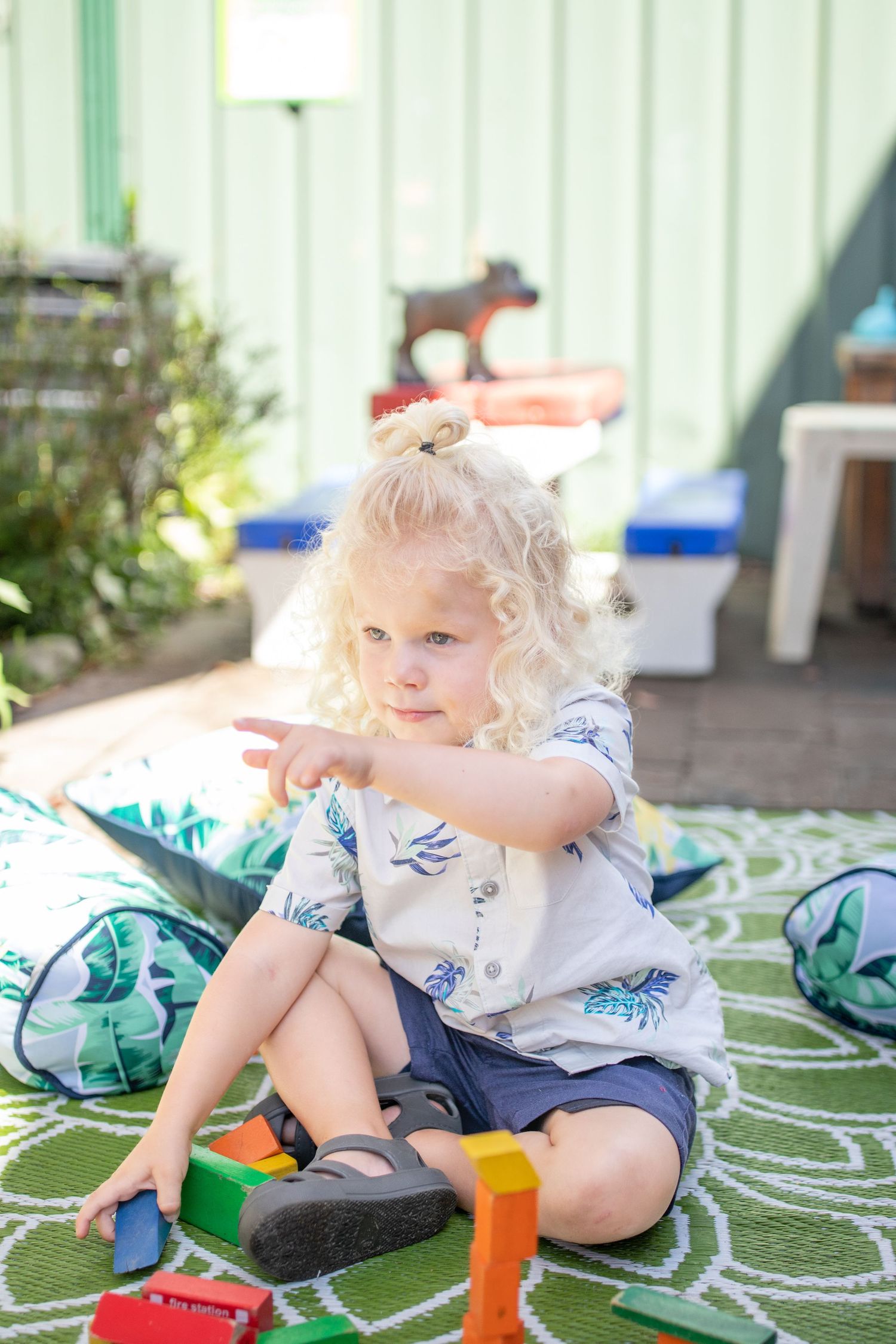 Candid preschool moment with children playing outdoors on the Coffs Coast
