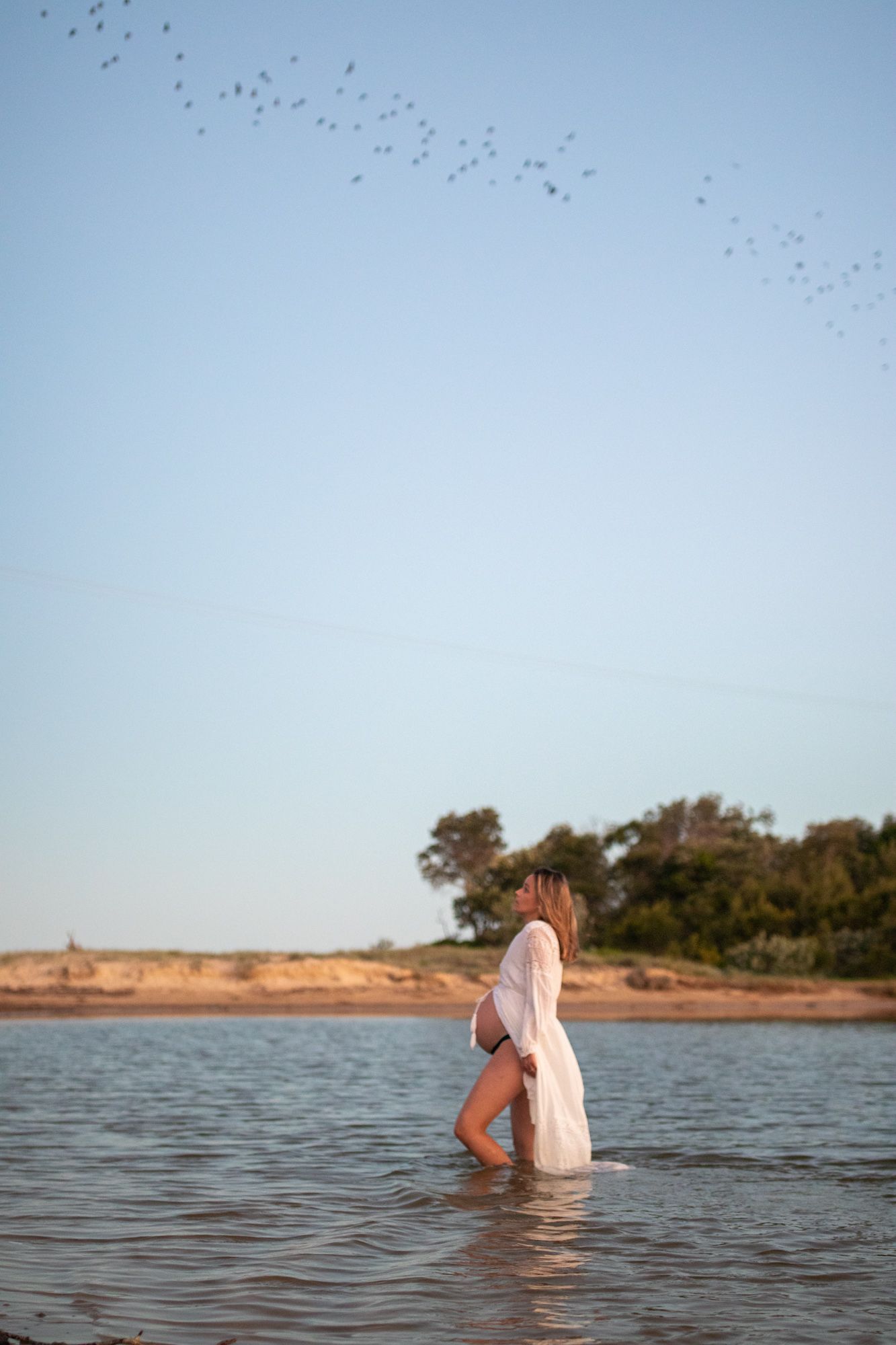 Candid maternity portrait at the beach – Coffs Coast photographer