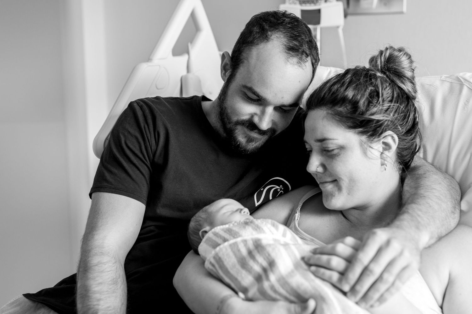 Emotional first family moments captured in a Fresh 48 session.