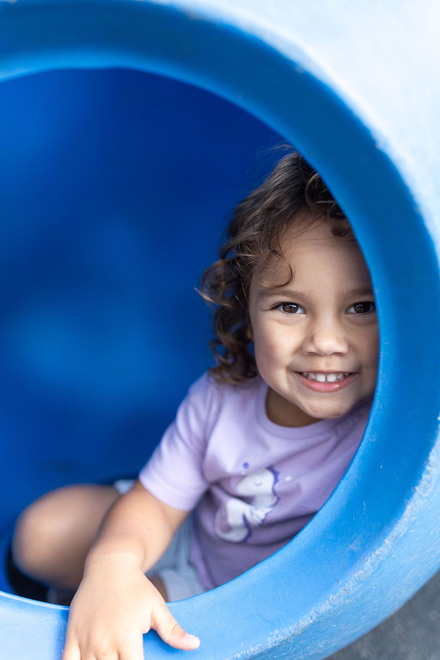 Candid preschool moment with children playing outdoors on the Coffs Coast