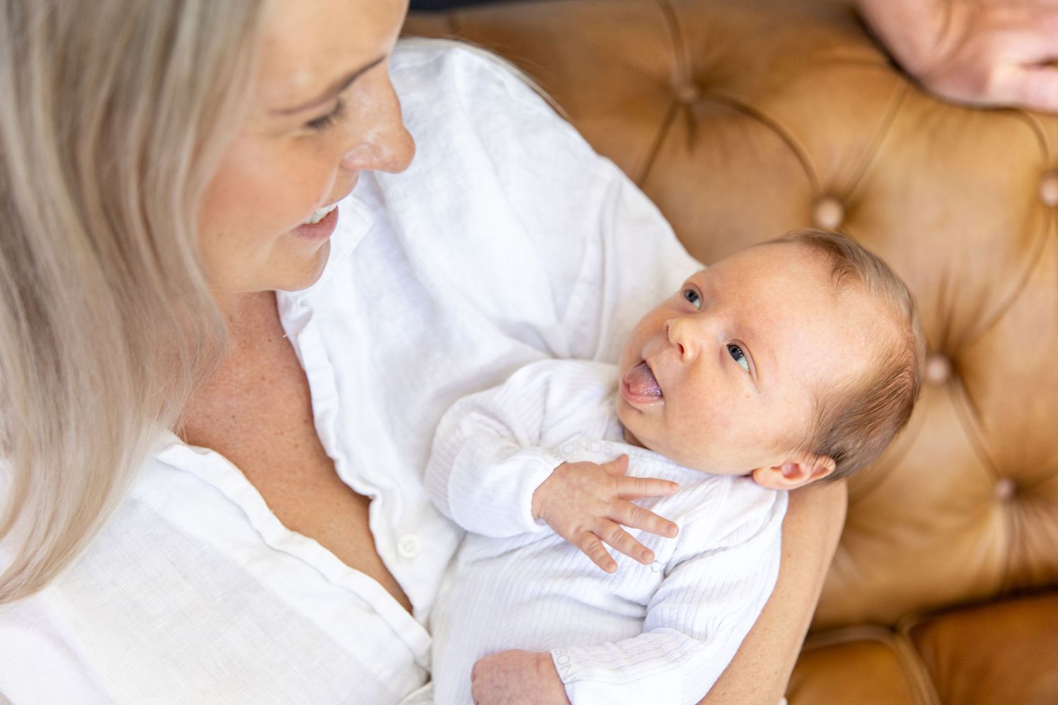 A tender moment captured in a series of intimate photos showing gentle affection and bonding.