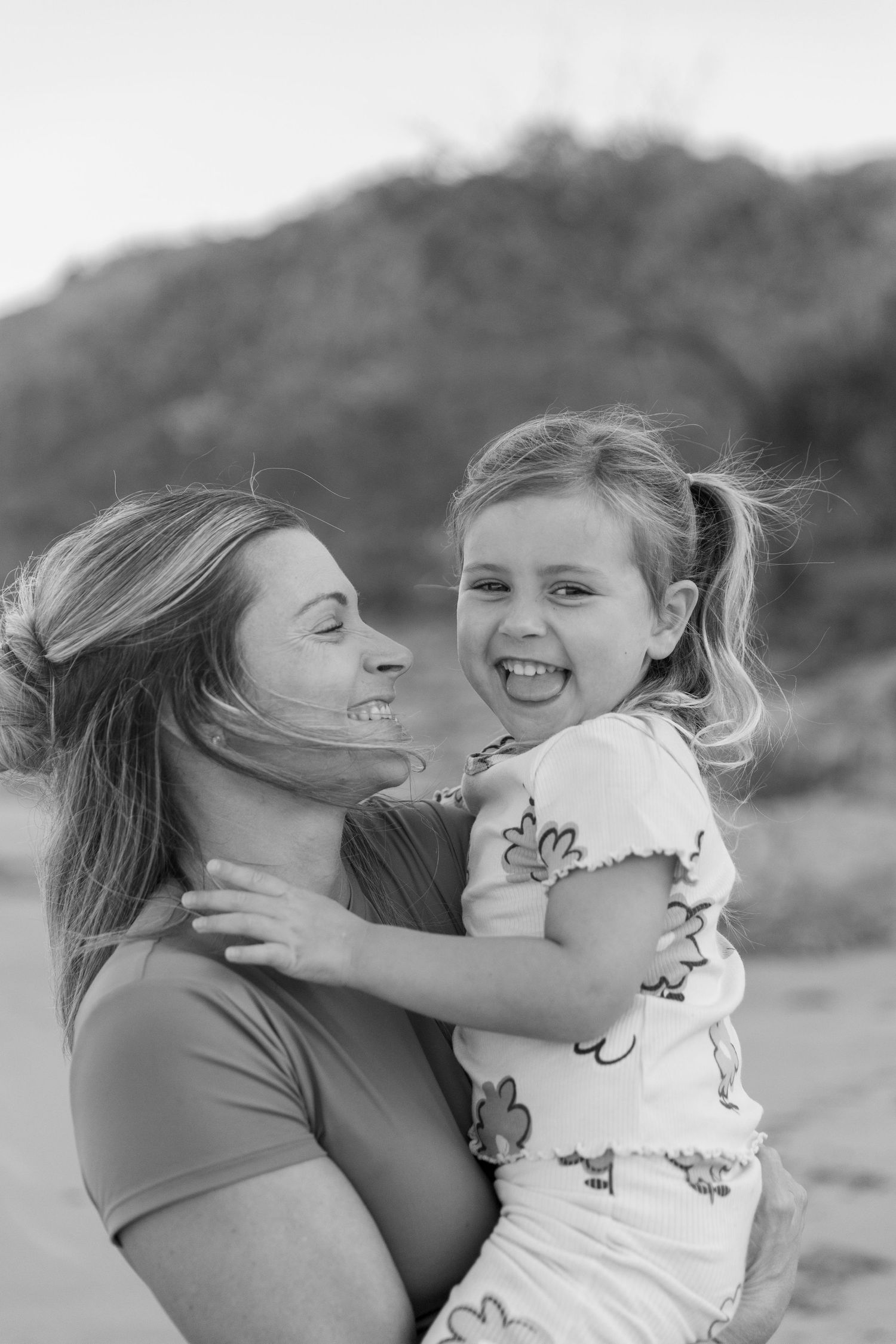 Candid family portrait at the beach – Coffs Coast photographer