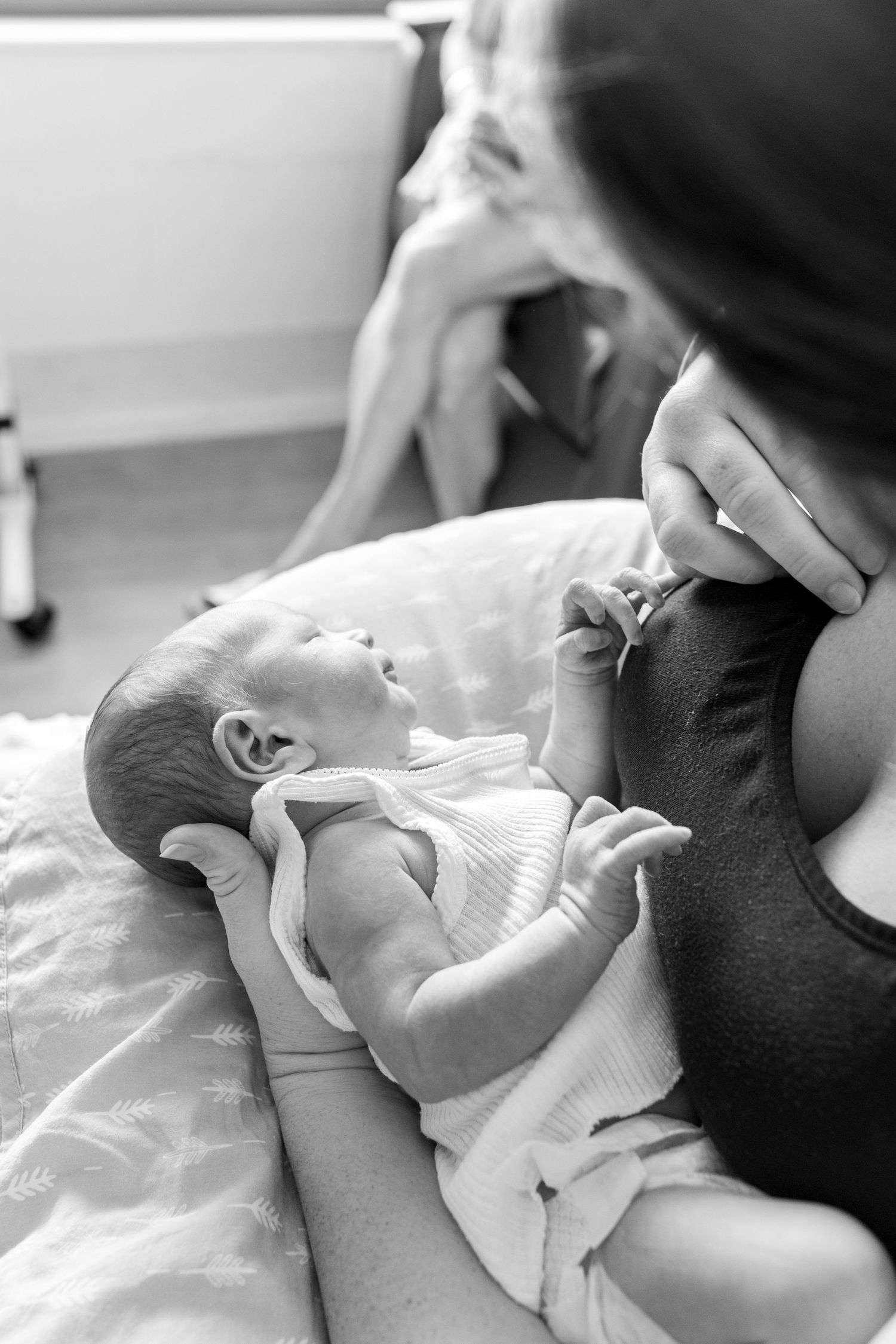 Emotional first family moments captured in a Fresh 48 session.