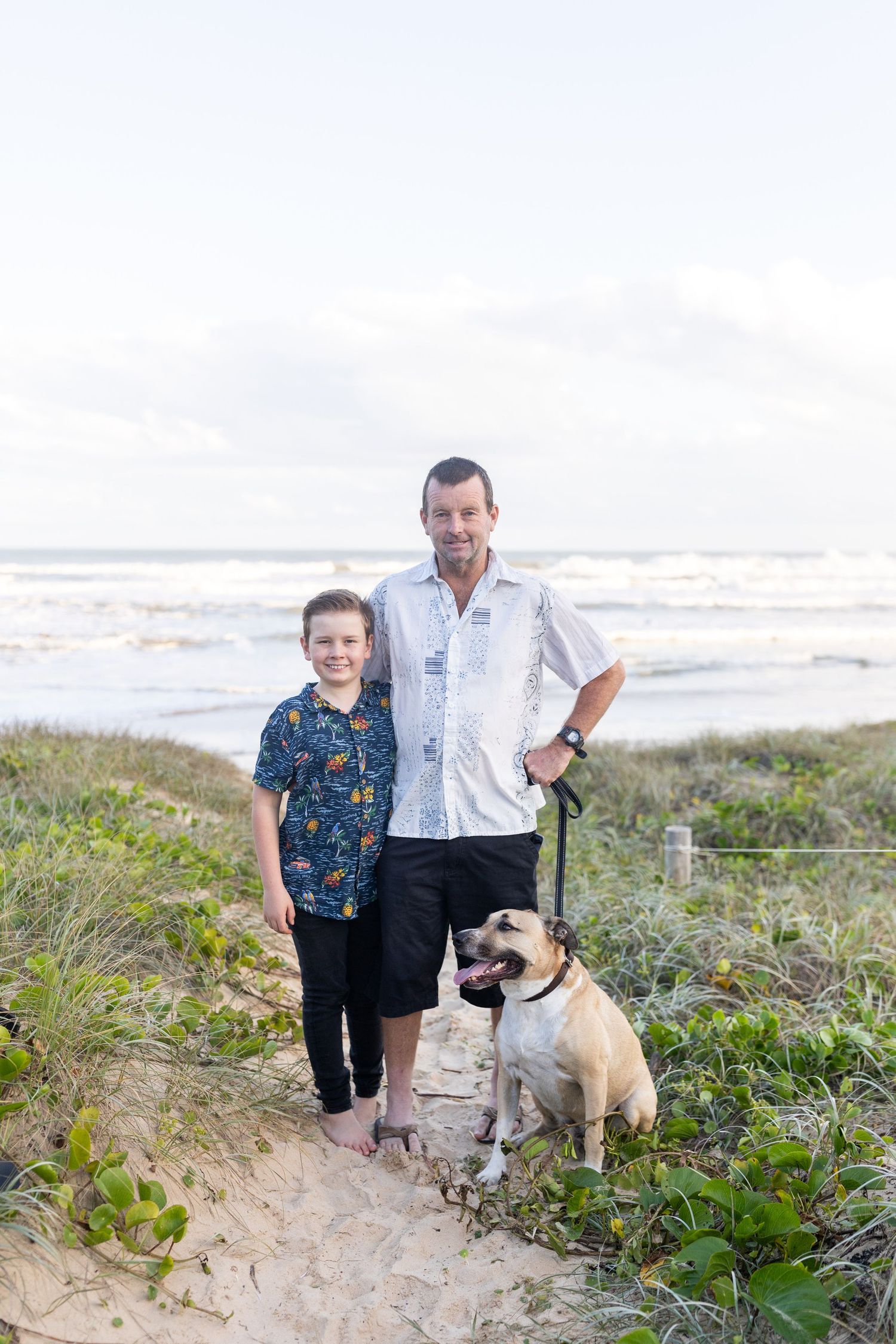Candid family photo at the beach on the Coffs Coast
