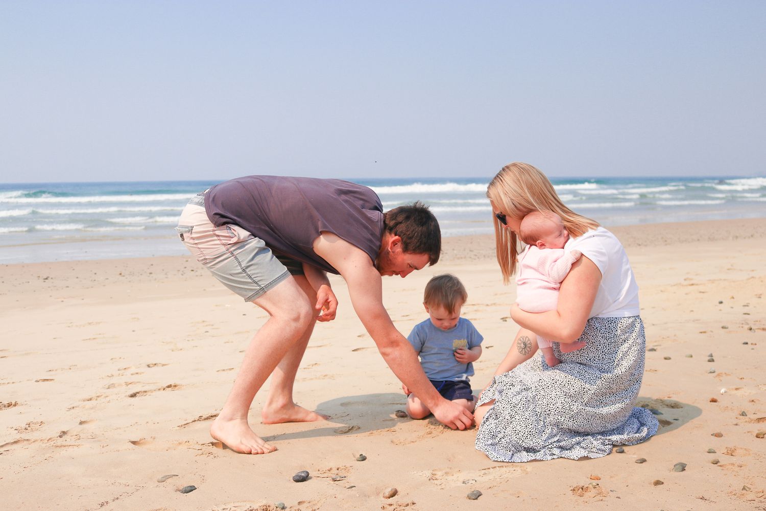 Candid family photo at the beach on the Coffs Coast
