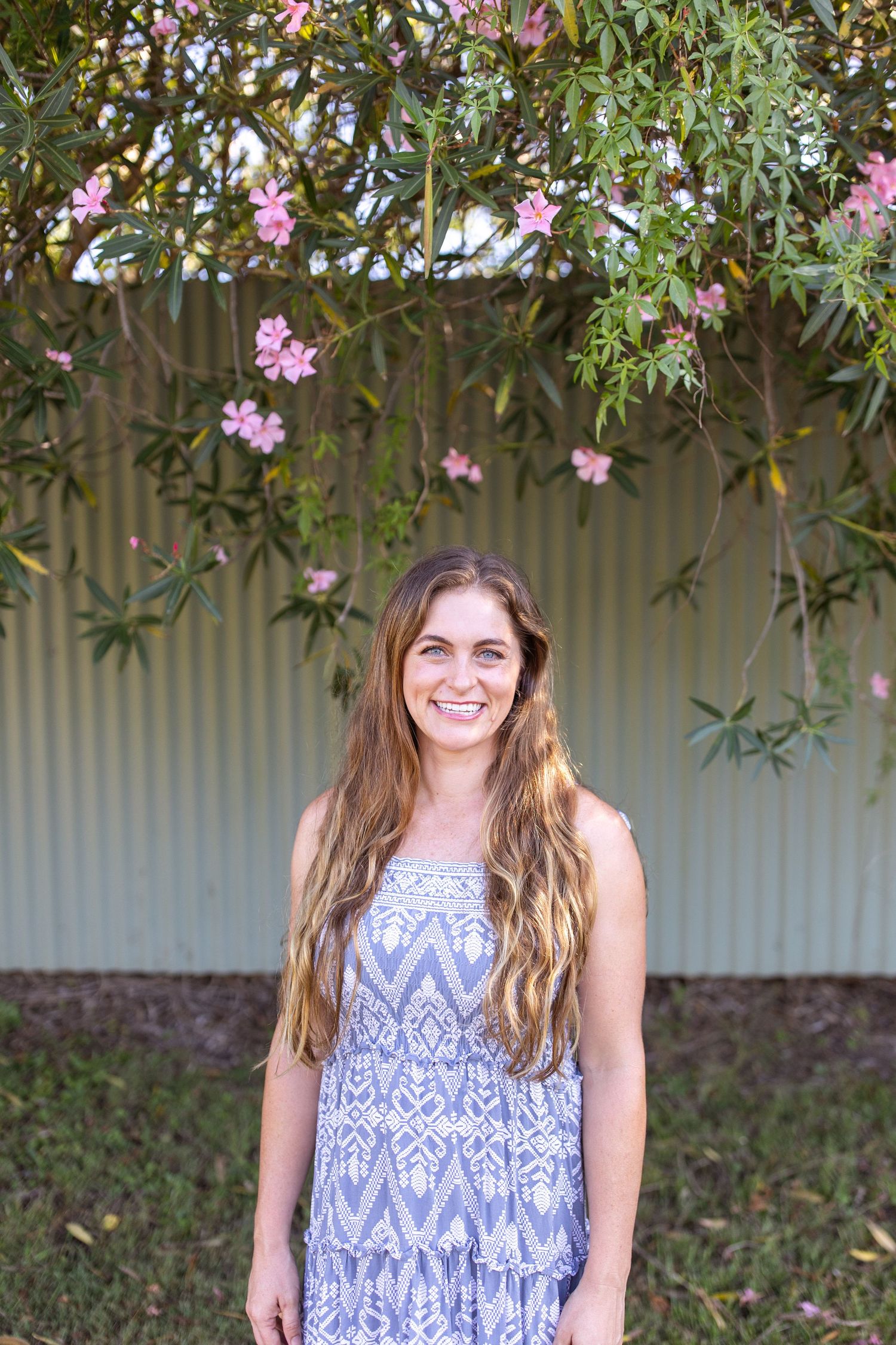 Relaxed branding photo of small business owner by the ocean on the Coffs Coast