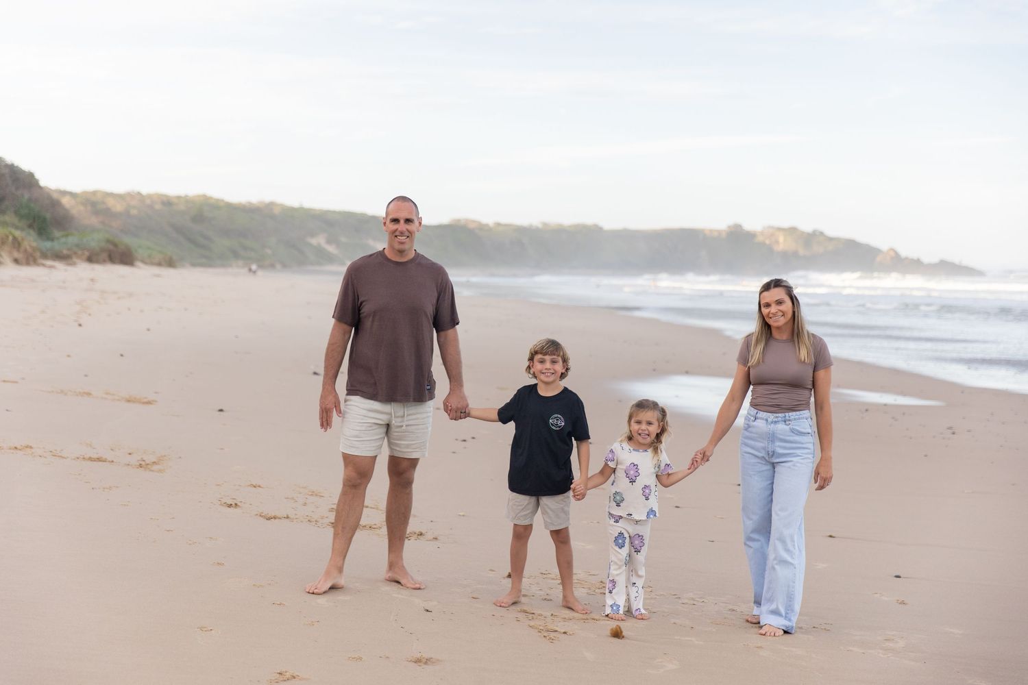 Candid family portrait at the beach – Coffs Coast photographer