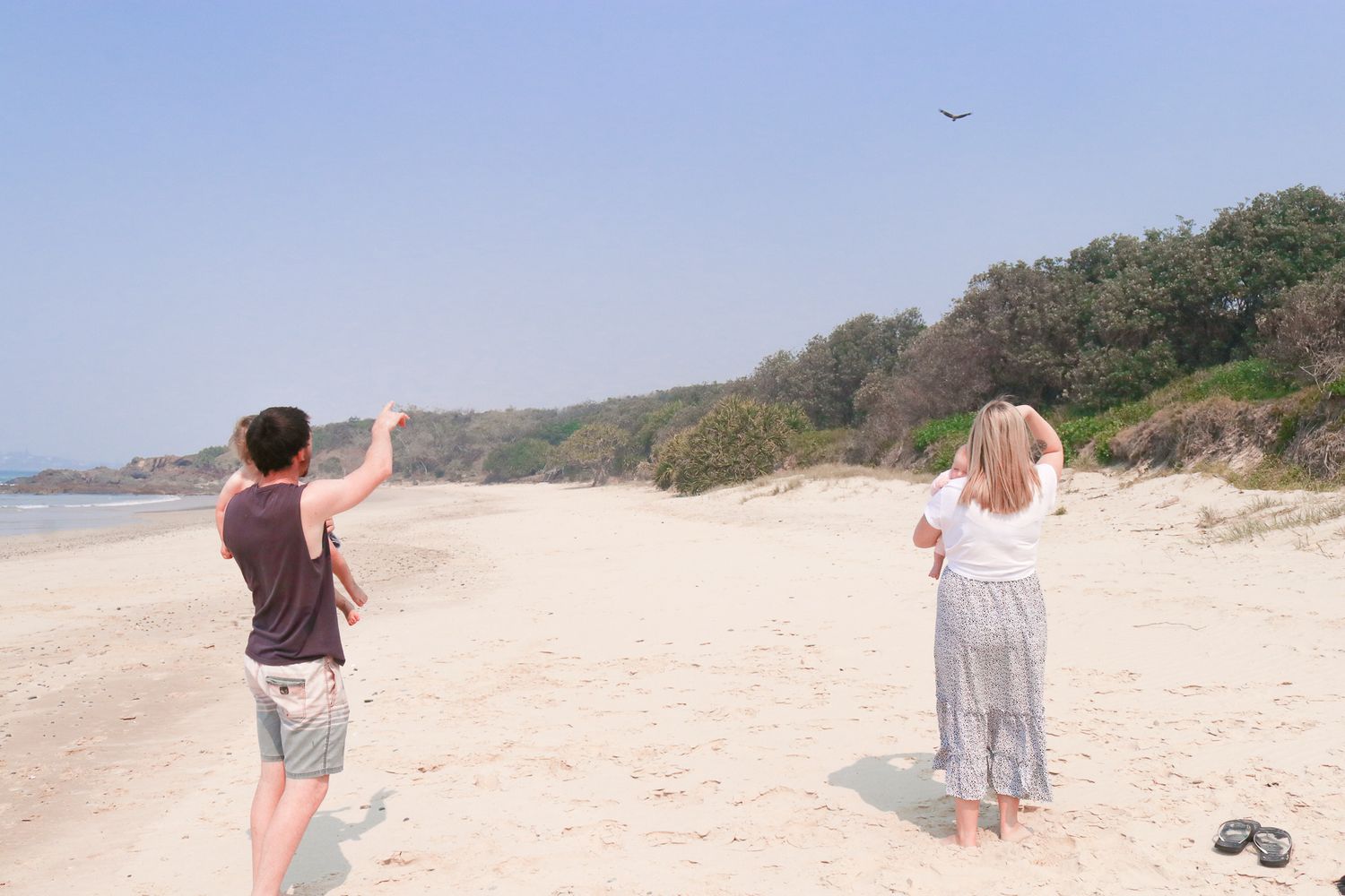 Candid family photo at the beach on the Coffs Coast