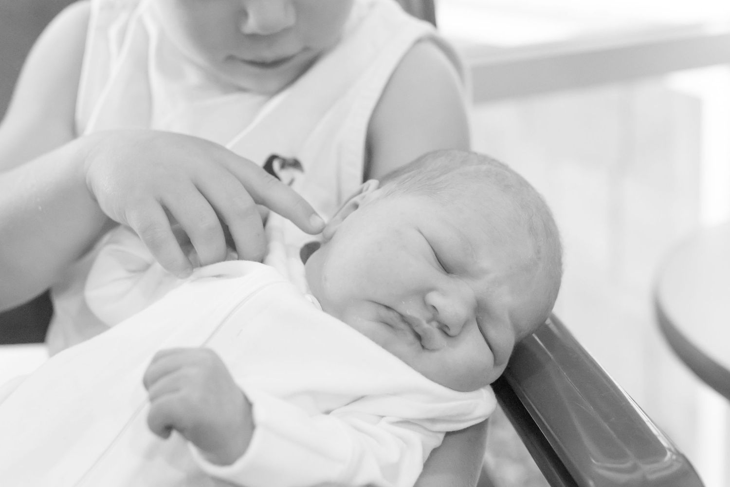 Emotional first family moments captured in a Fresh 48 session.