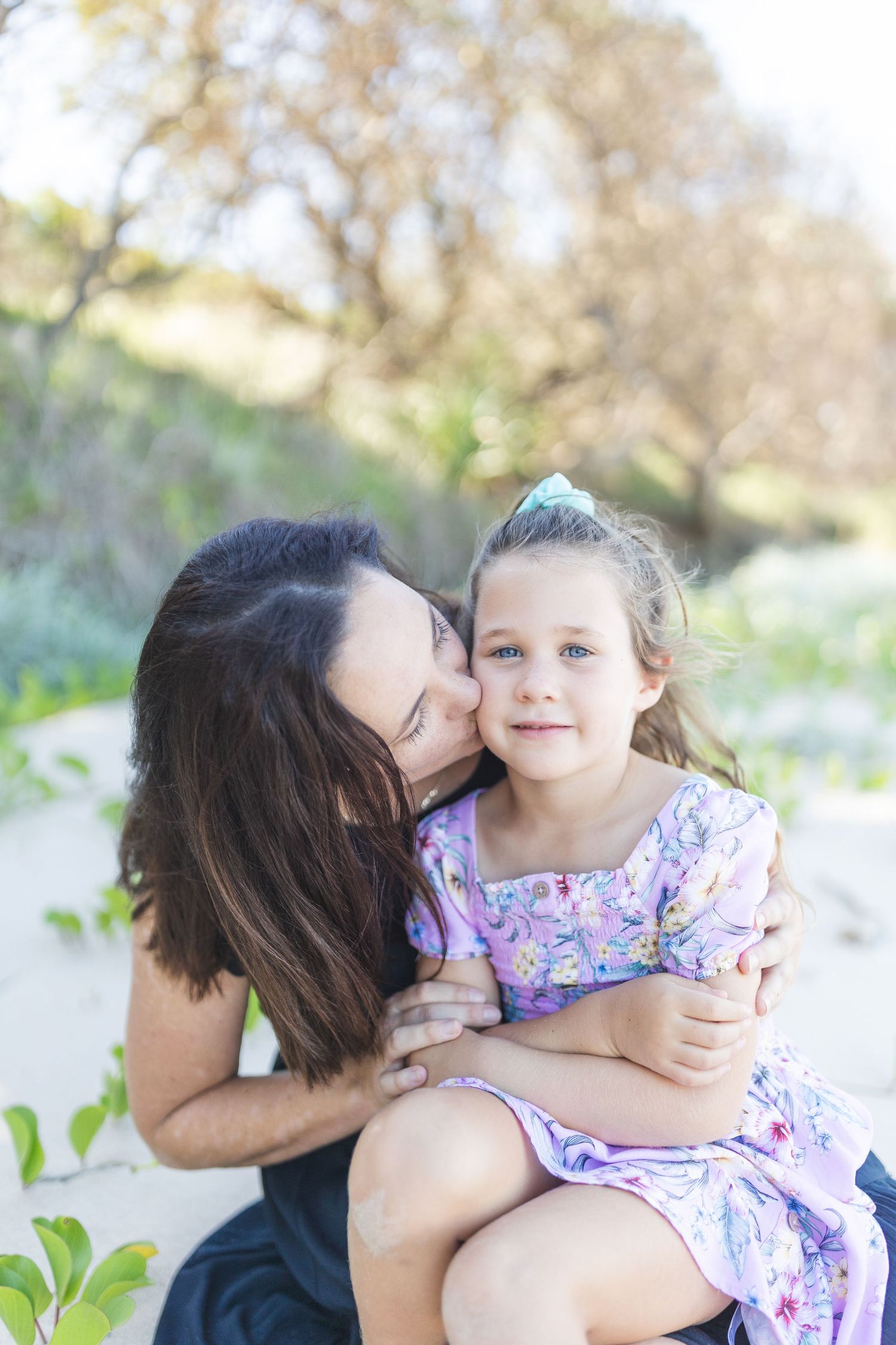 Candid family photo at the beach on the Coffs Coast