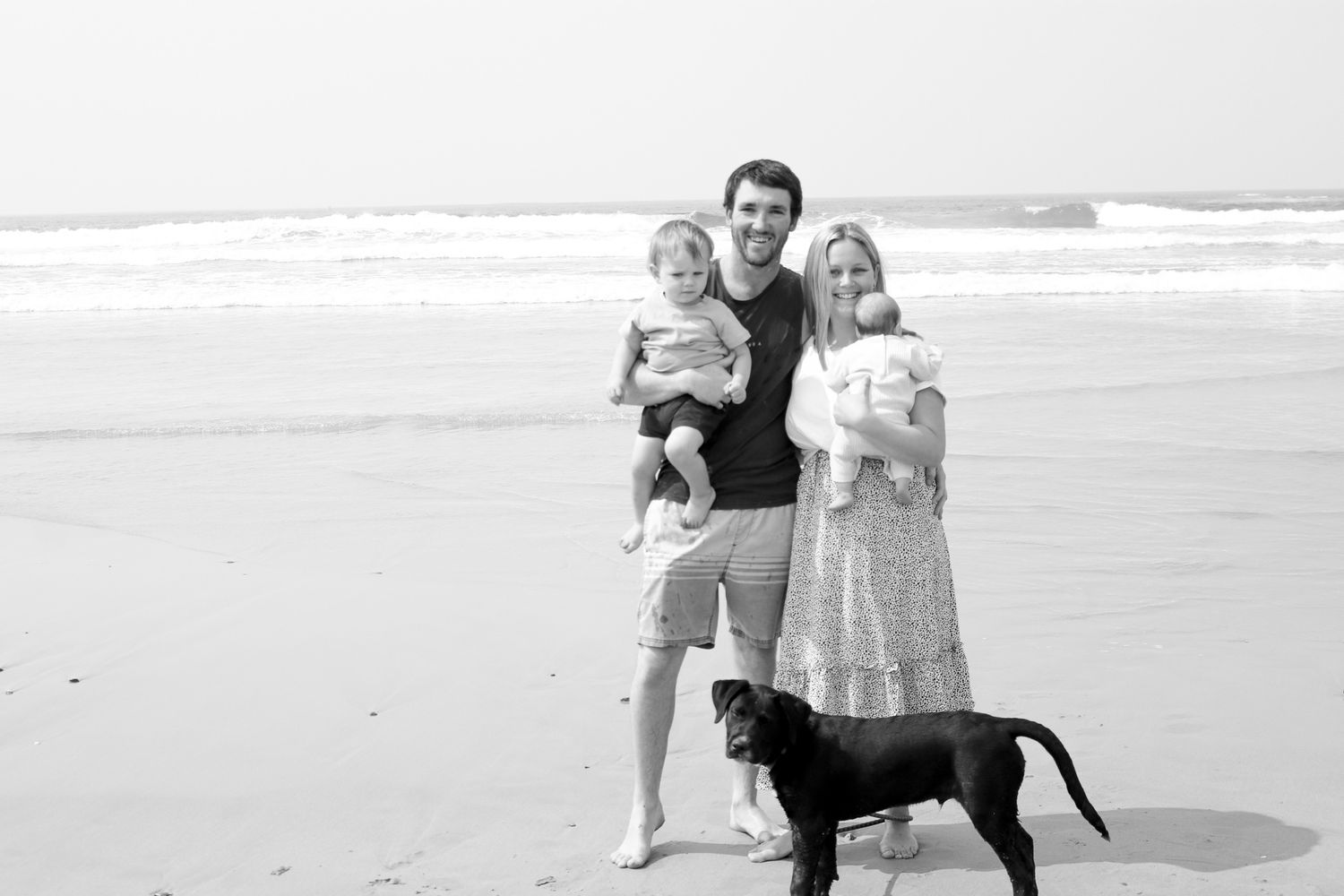 Candid family photo at the beach on the Coffs Coast