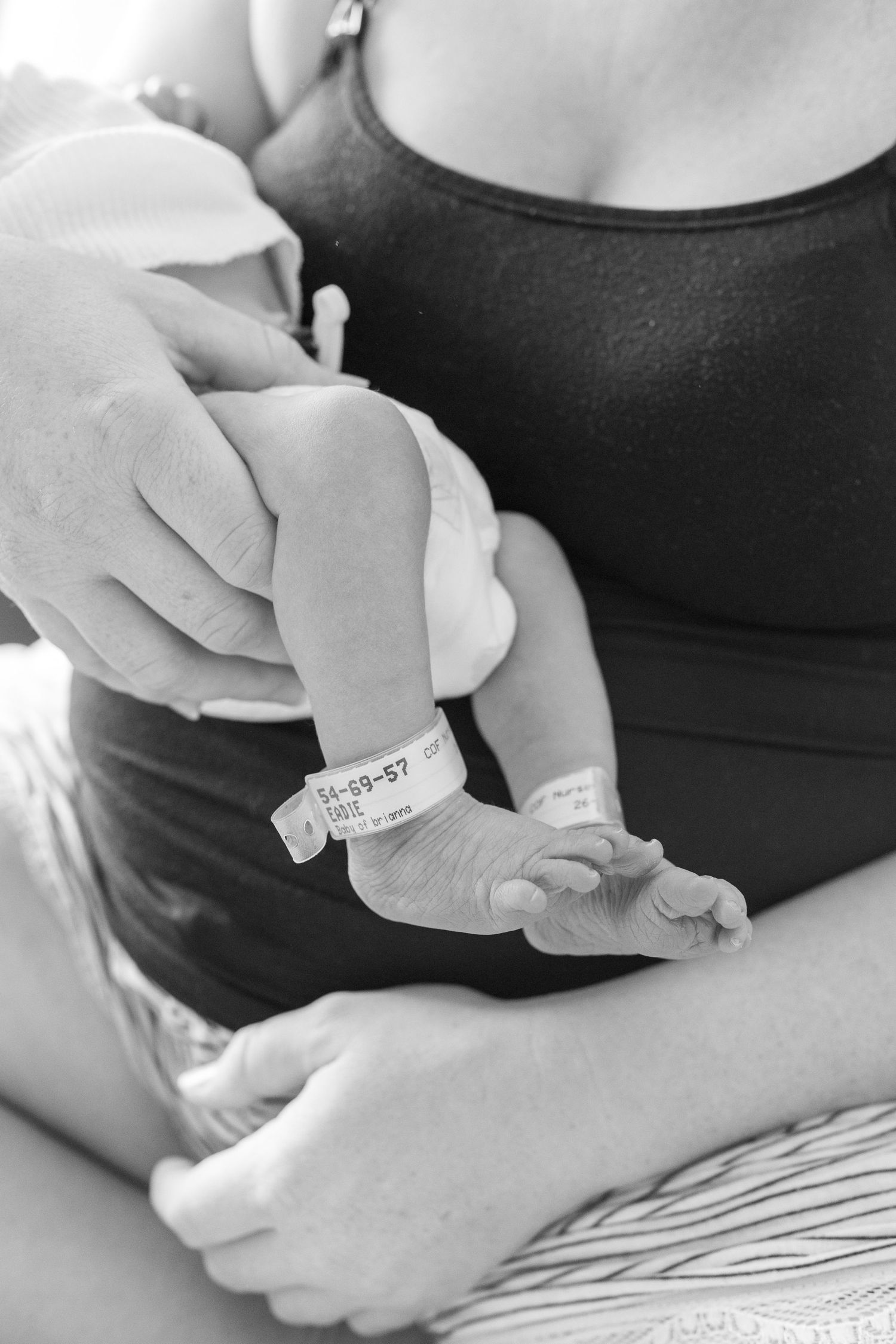 Emotional first family moments captured in a Fresh 48 session.