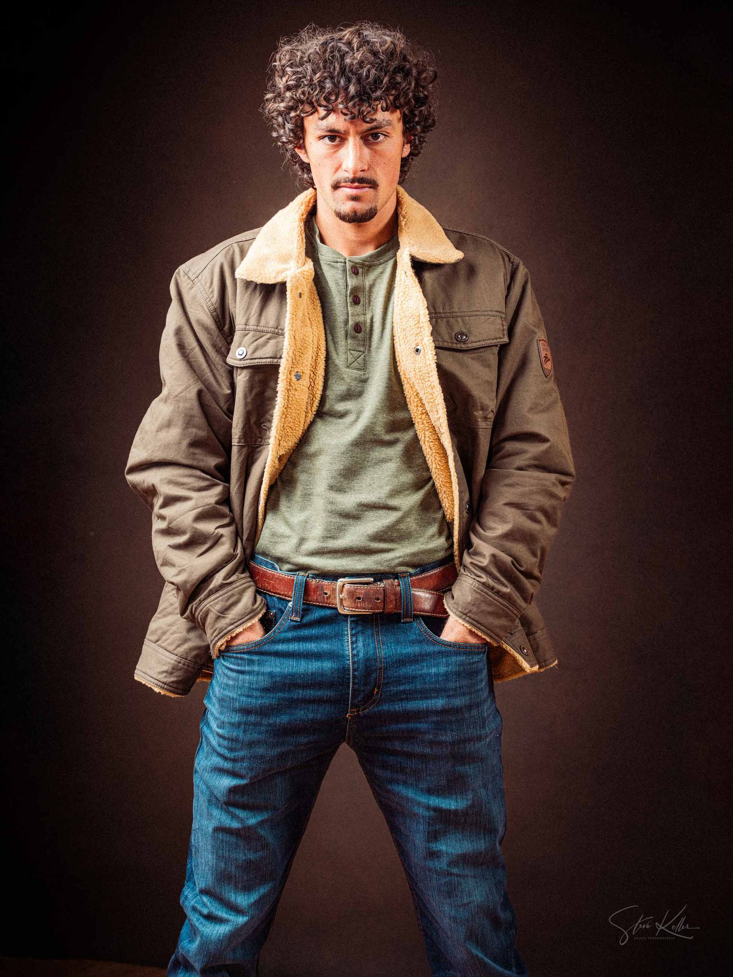 A person wearing a brown jacket and jeans poses against a dark background in a series of stylish portrait shots.